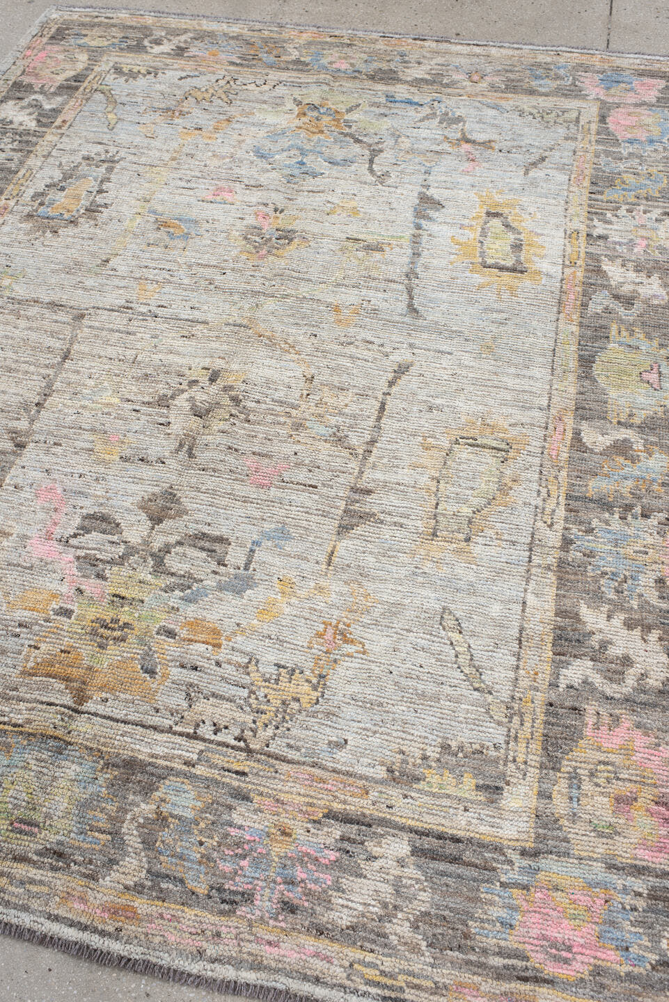 6' x 7' one-of-a-kind handmade vintage Oushak rug. Color palette: light gray, charcoal, ivory, powder blue, blush, gold