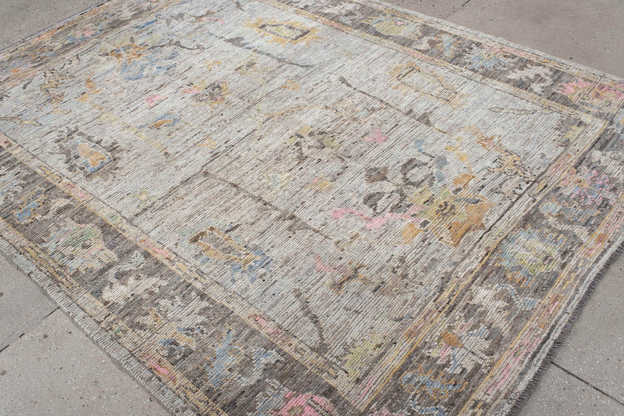 6' x 7' one-of-a-kind handmade vintage Oushak rug. Color palette: light gray, charcoal, ivory, powder blue, blush, gold
