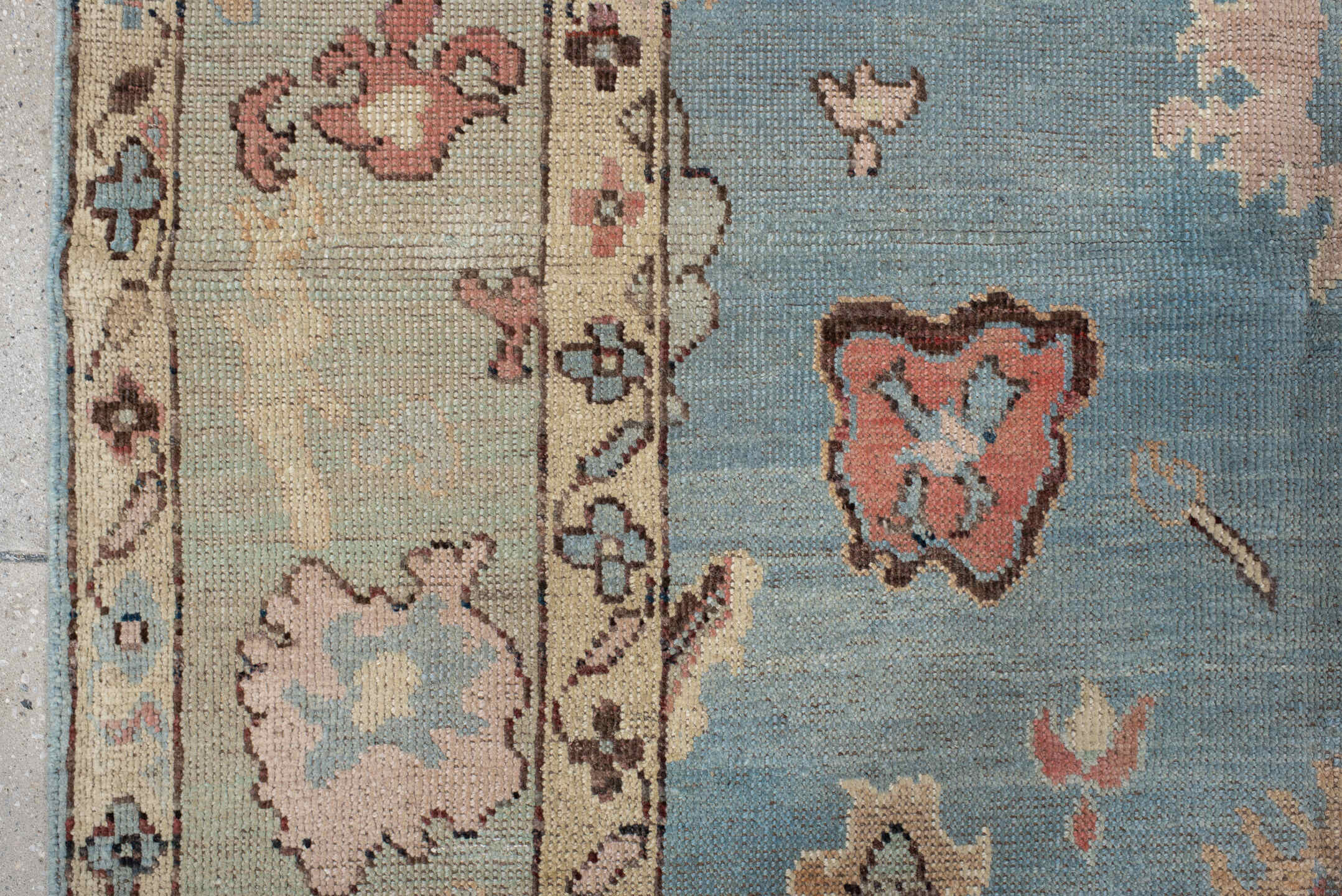 5' x 7' one-of-a-kind handmade vintage Oushak medium size rug. Color palette: sky blue, ivory, sage, rust, rose, taupe