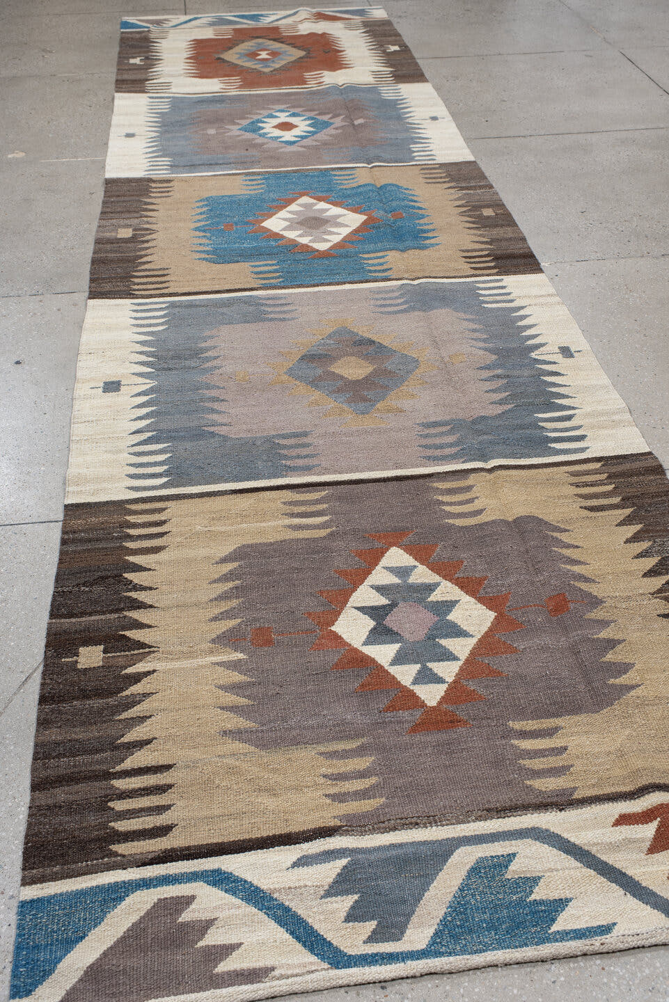 4' x 15' one-of-a-kind handmade vintage Kilim runner rug. Color palette: ivory, taupe, slate, sky blue, charcoal, rust