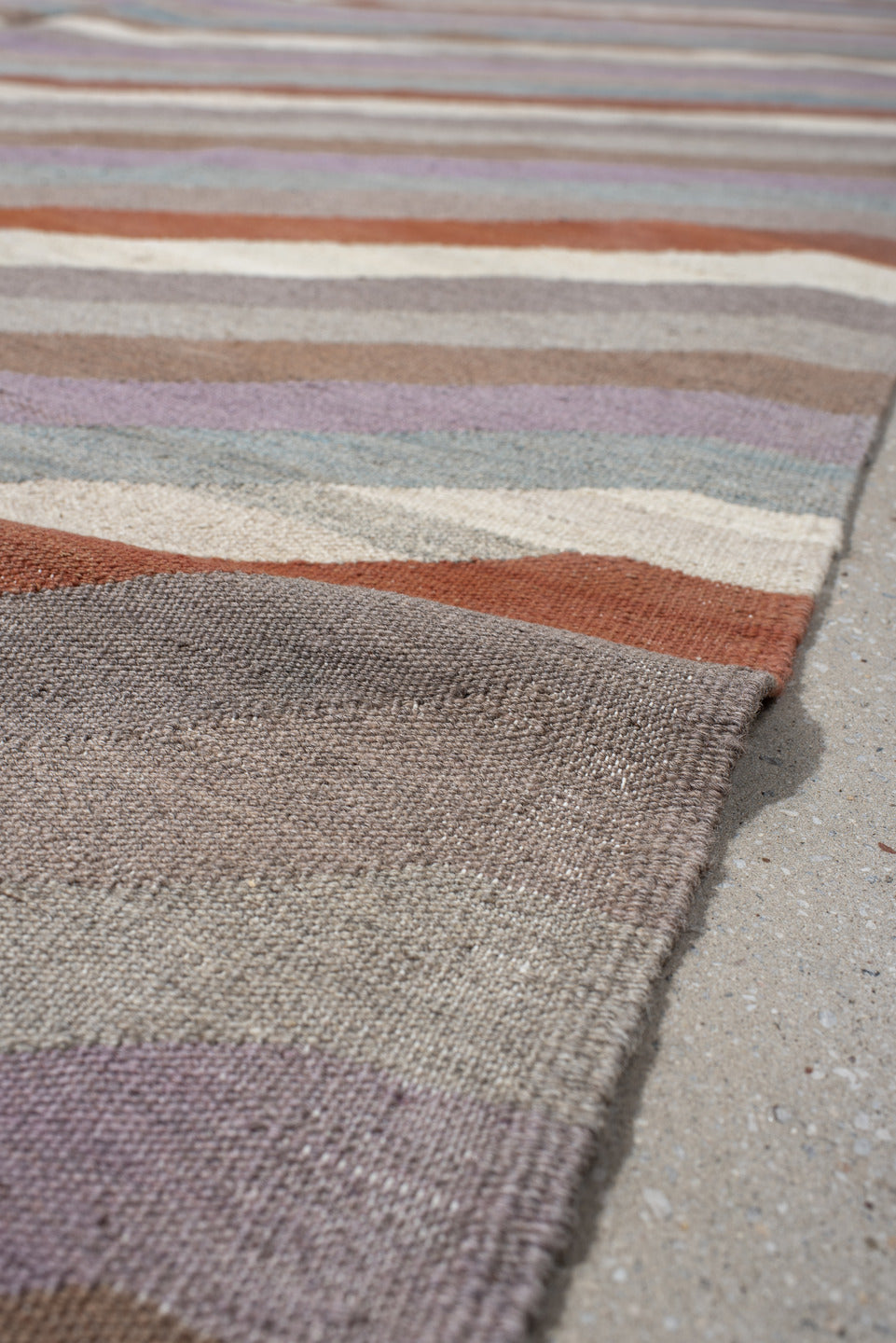 3' x 9' one-of-a-kind handmade vintage Kilim runner rug. Color palette: taupe, ivory, rust, lavender, pale_blue, camel