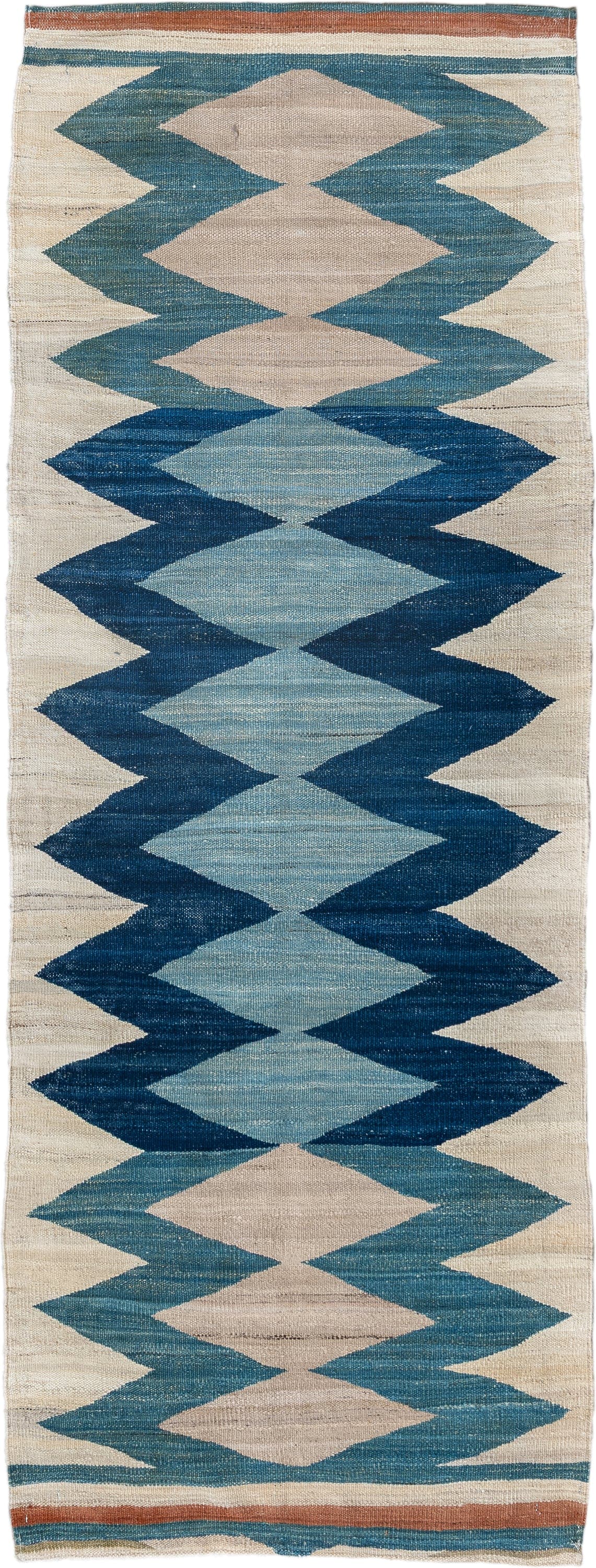 2' x 6' one-of-a-kind handmade vintage Kilim runner rug. Color palette: ivory, indigo, sky blue, teal, camel, rust, purple
