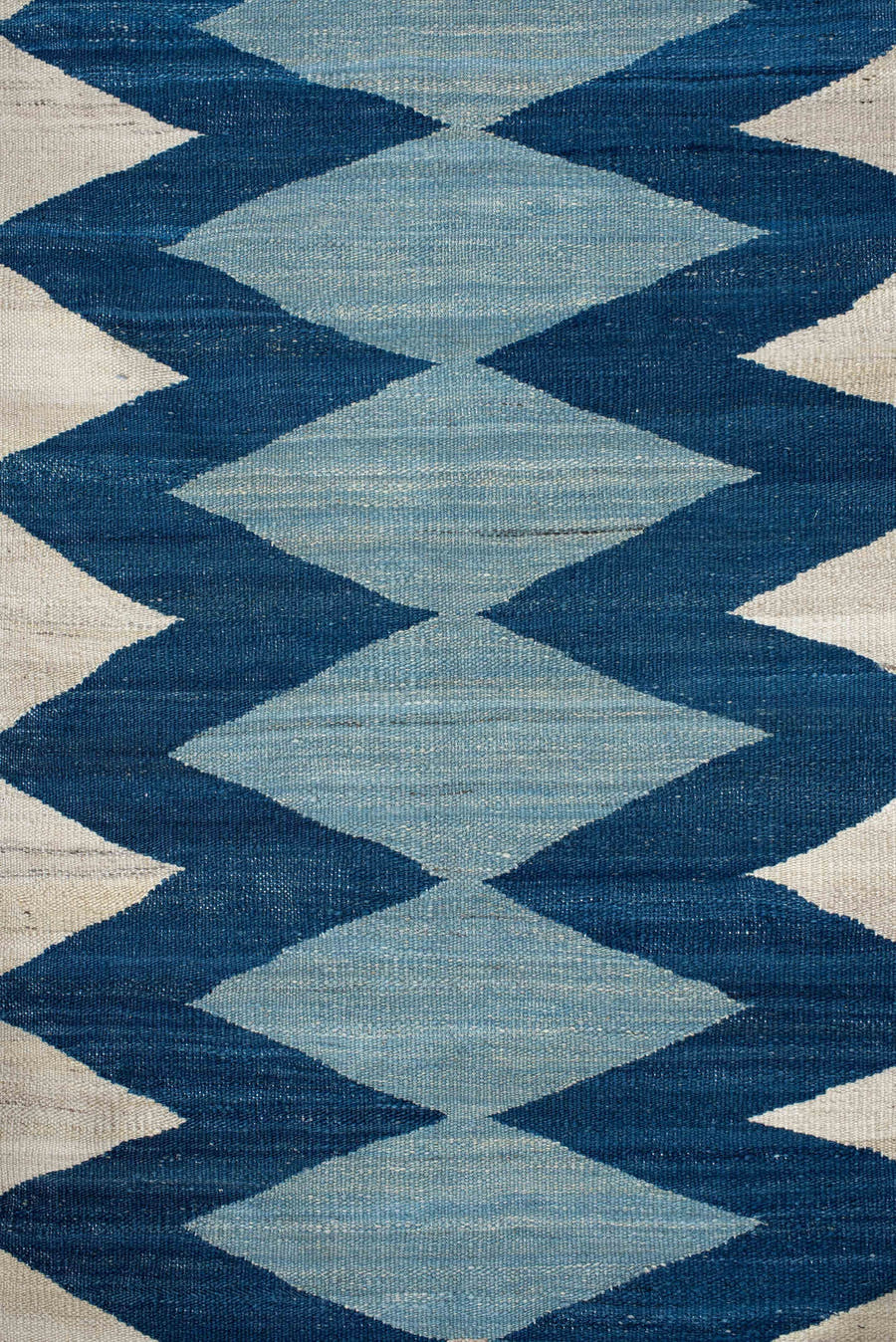 2' x 6' one-of-a-kind handmade vintage Kilim runner rug. Color palette: ivory, indigo, sky blue, teal, camel, rust, purple