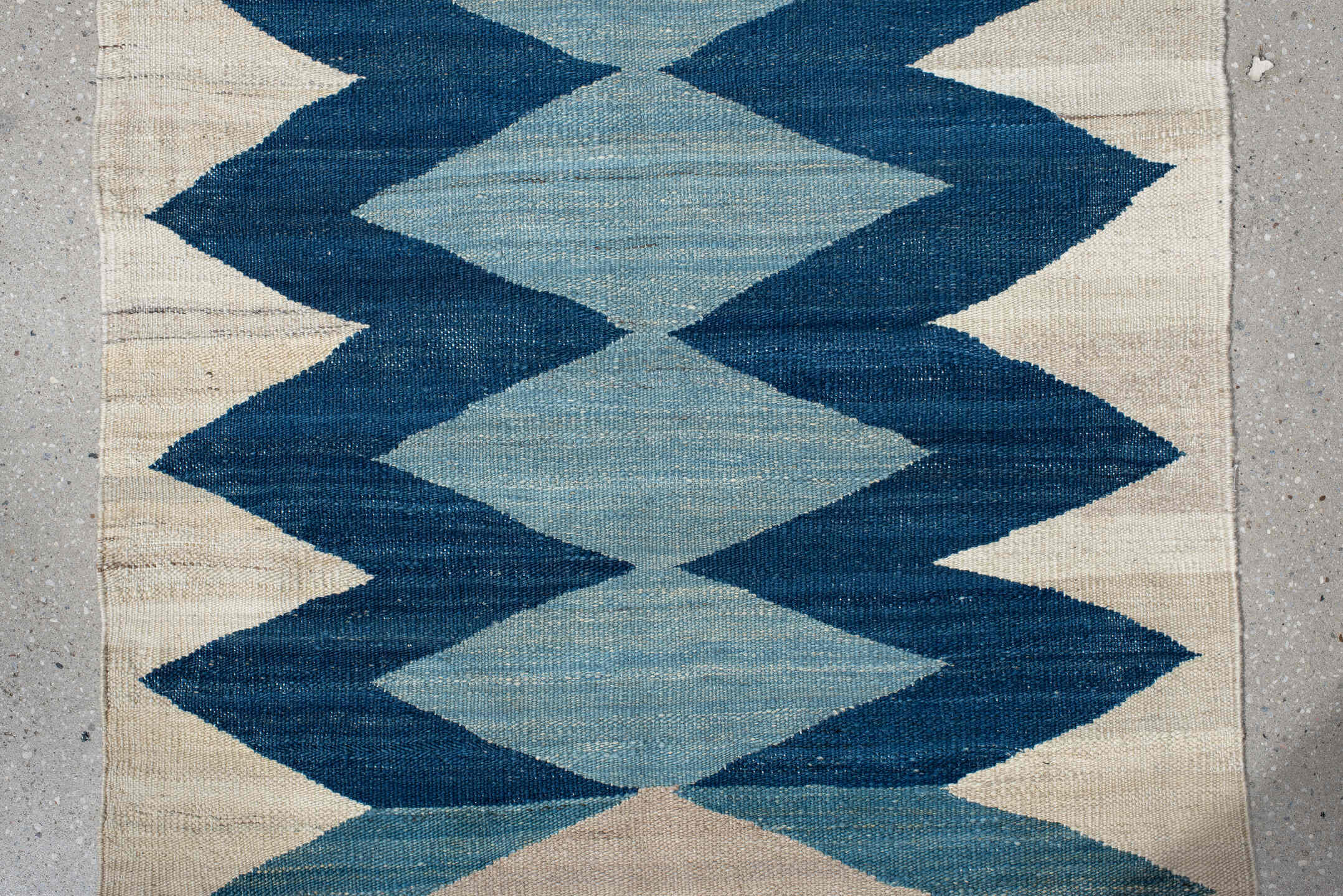 2' x 6' one-of-a-kind handmade vintage Kilim runner rug. Color palette: ivory, indigo, sky blue, teal, camel, rust, purple