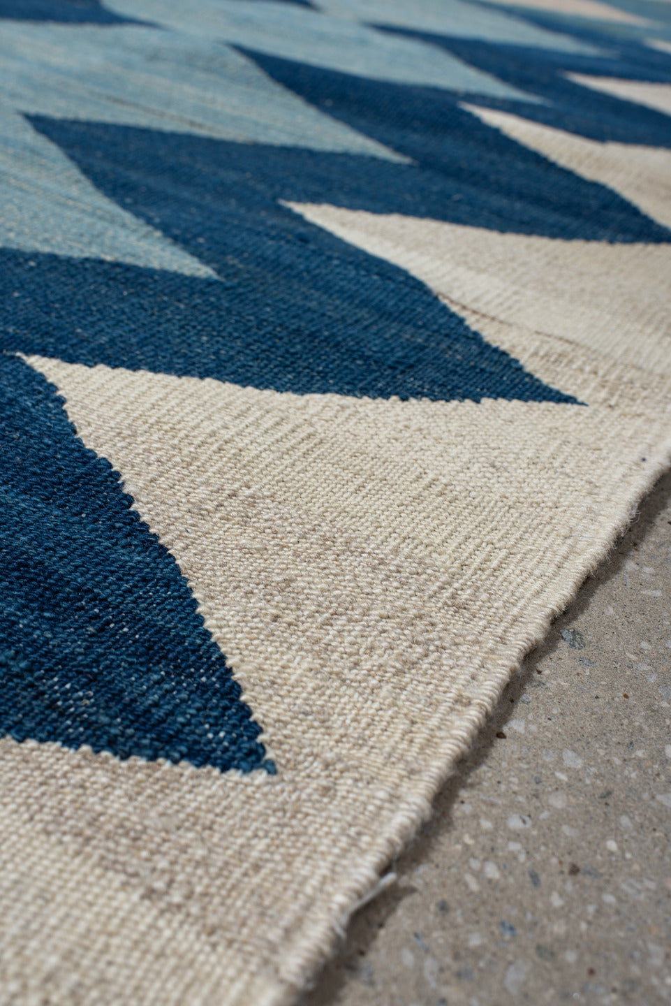 2' x 6' one-of-a-kind handmade vintage Kilim runner rug. Color palette: ivory, indigo, sky blue, teal, camel, rust, purple