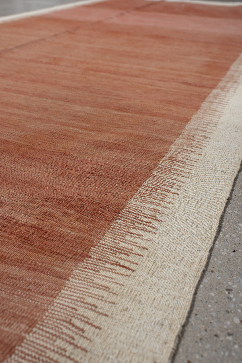 2' x 10' one-of-a-kind handmade vintage Kilim runner rug. Color palette: terra cotta, ivory, rose, camel, terracotta, brown