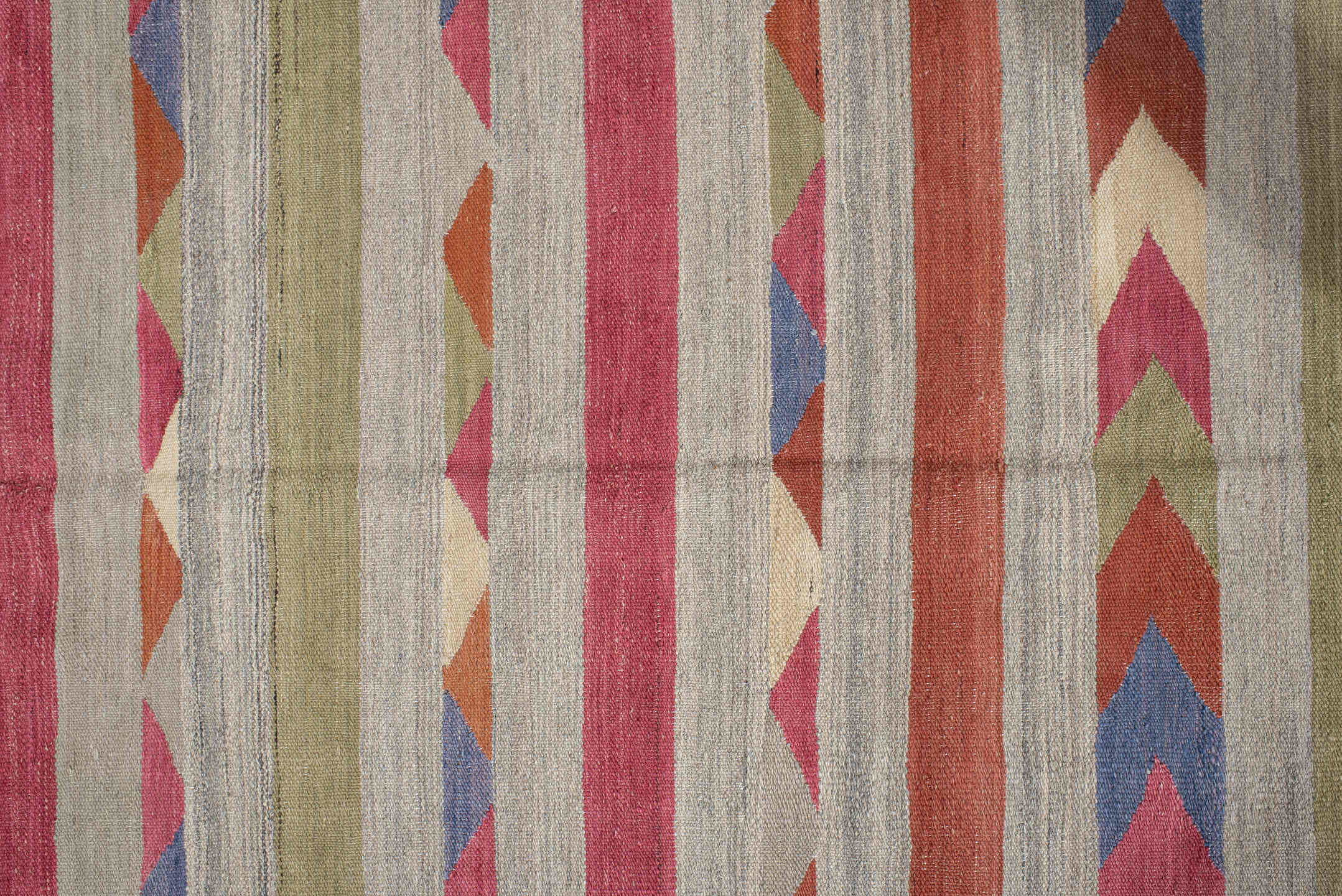 3' x 9' one-of-a-kind handmade vintage Kilim runner rug. Color palette: blue, brown, gray, light gray, off-white, pink, red