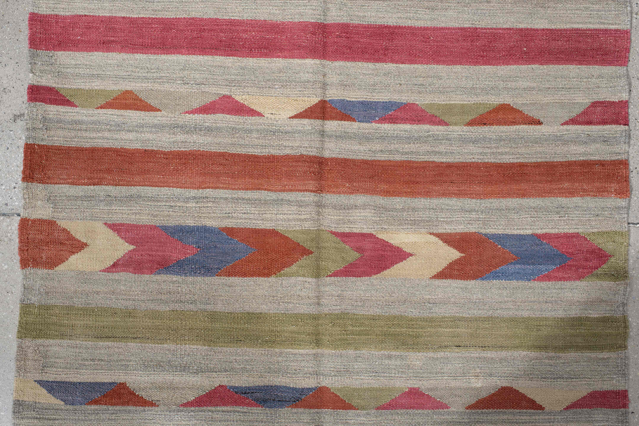 3' x 9' one-of-a-kind handmade vintage Kilim runner rug. Color palette: blue, brown, gray, light gray, off-white, pink, red