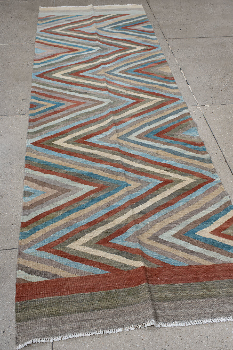 3' x 9' one-of-a-kind handmade vintage Kilim runner rug. Color palette: gray, rust, sky_blue, ivory, taupe, sage, sand