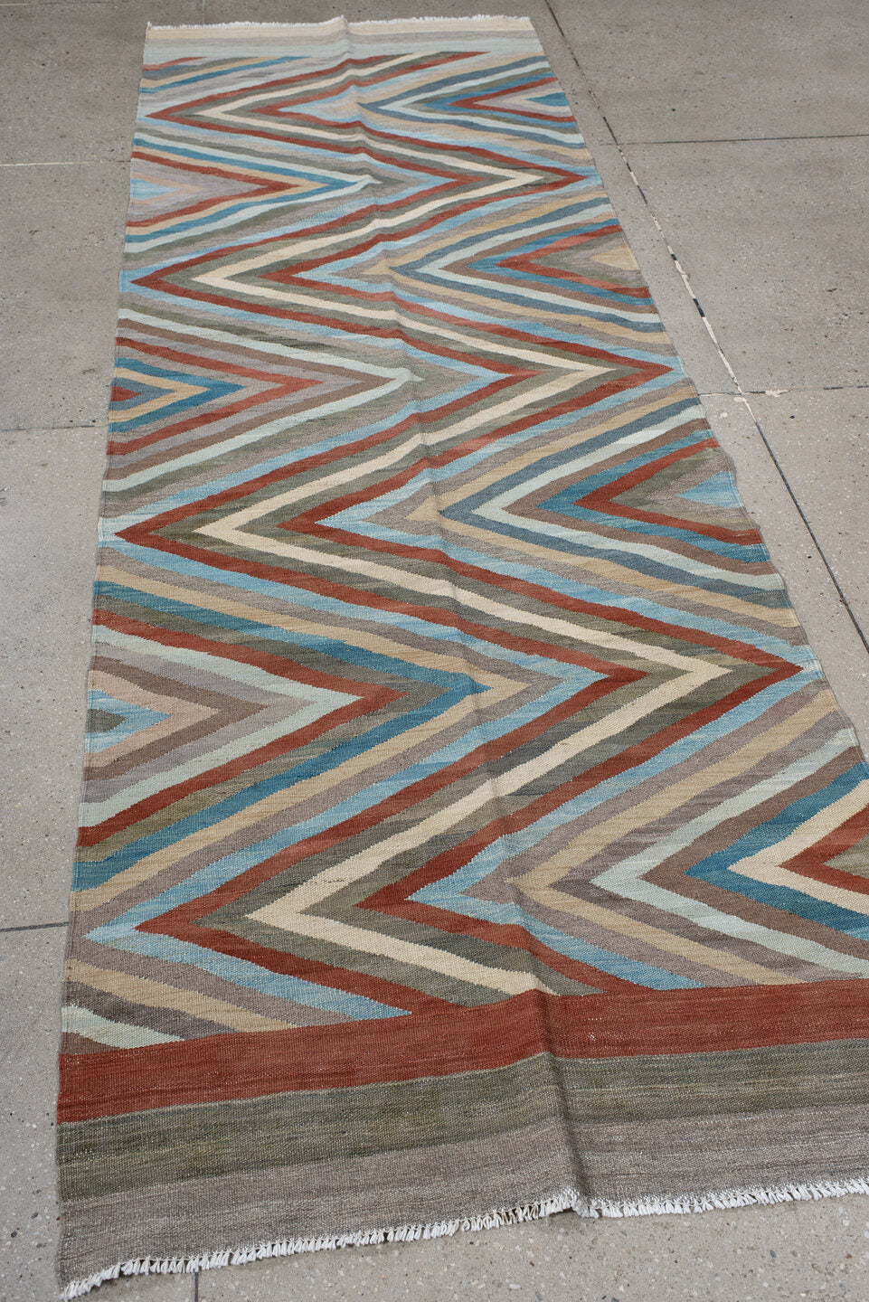 3' x 9' one-of-a-kind handmade vintage Kilim runner rug. Color palette: gray, rust, sky_blue, ivory, taupe, sage, sand