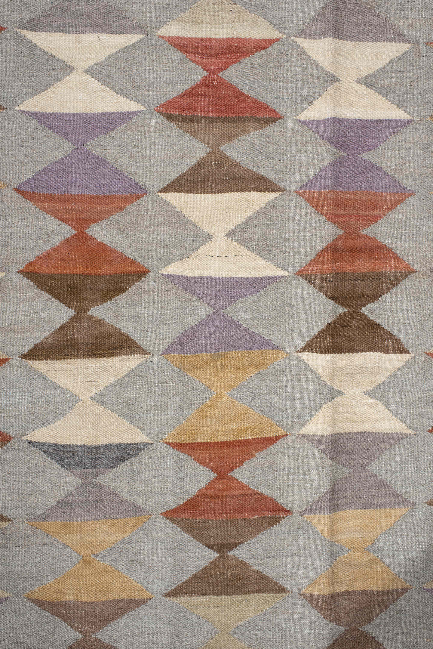 3' x 9' one-of-a-kind handmade vintage Kilim runner rug. Color palette: gray, taupe, ivory, brown, rust, lavender, camel
