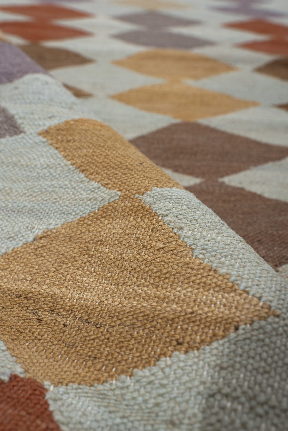 3' x 9' one-of-a-kind handmade vintage Kilim runner rug. Color palette: ivory, taupe, camel, lavender, rust, brown, sand