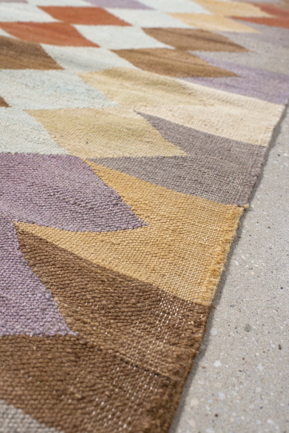3' x 9' one-of-a-kind handmade vintage Kilim runner rug. Color palette: ivory, taupe, camel, lavender, rust, brown, sand