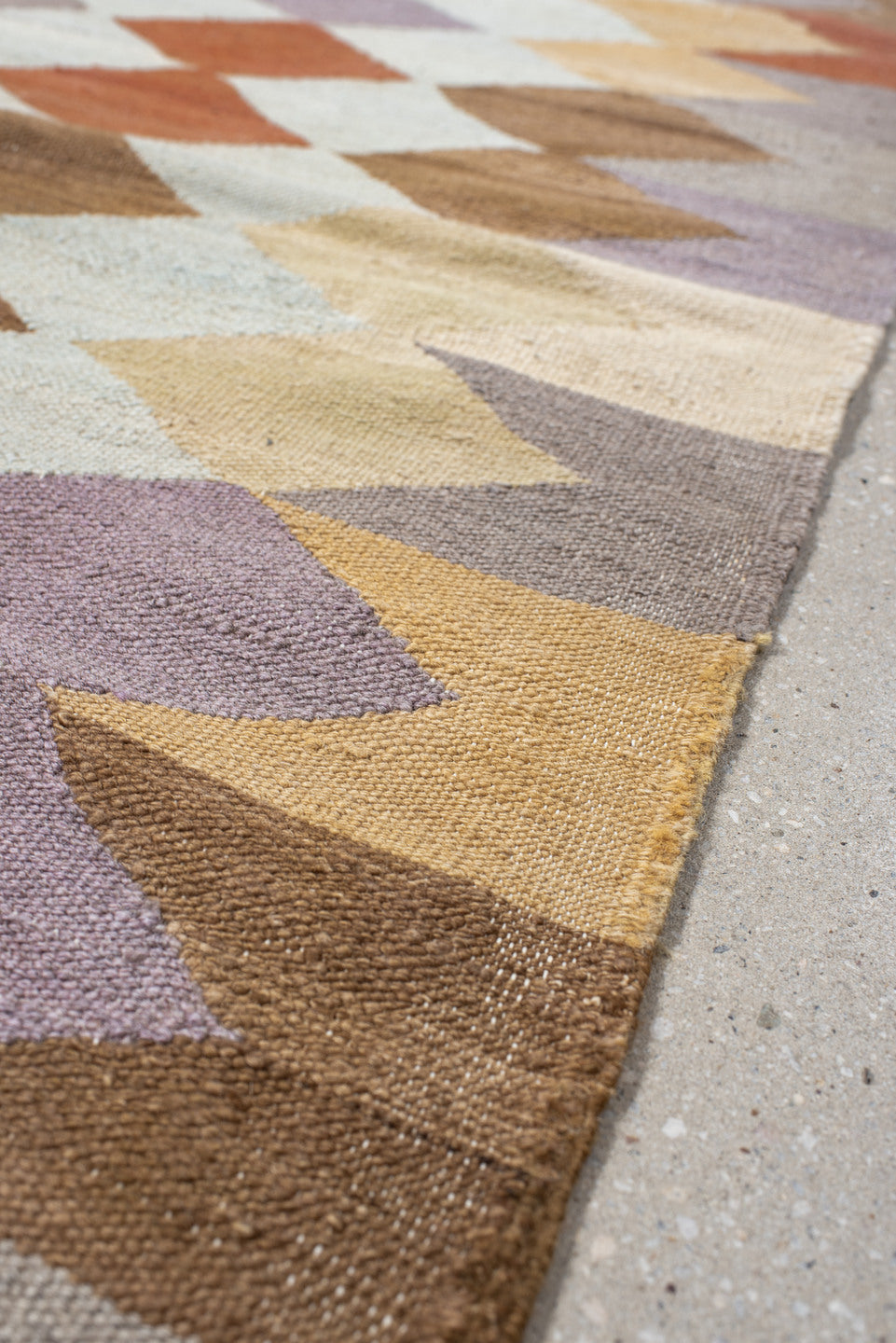 3' x 9' one-of-a-kind handmade vintage Kilim runner rug. Color palette: ivory, taupe, camel, lavender, rust, brown, sand