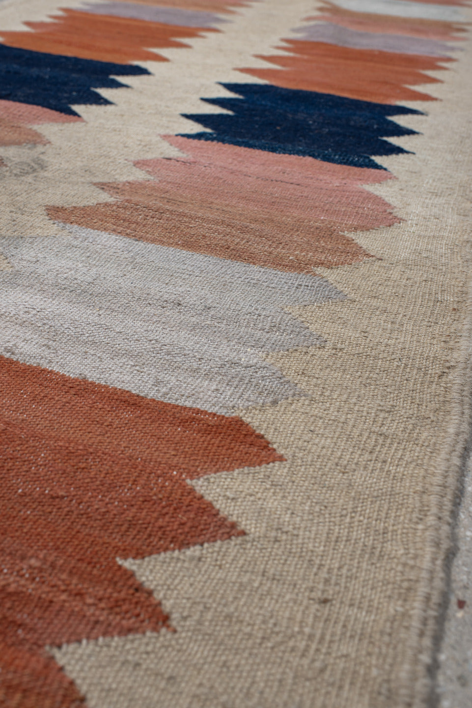 2' x 8' one-of-a-kind handmade vintage Kilim runner rug. Color palette: gray, brown, light gray, off-white, black, pink