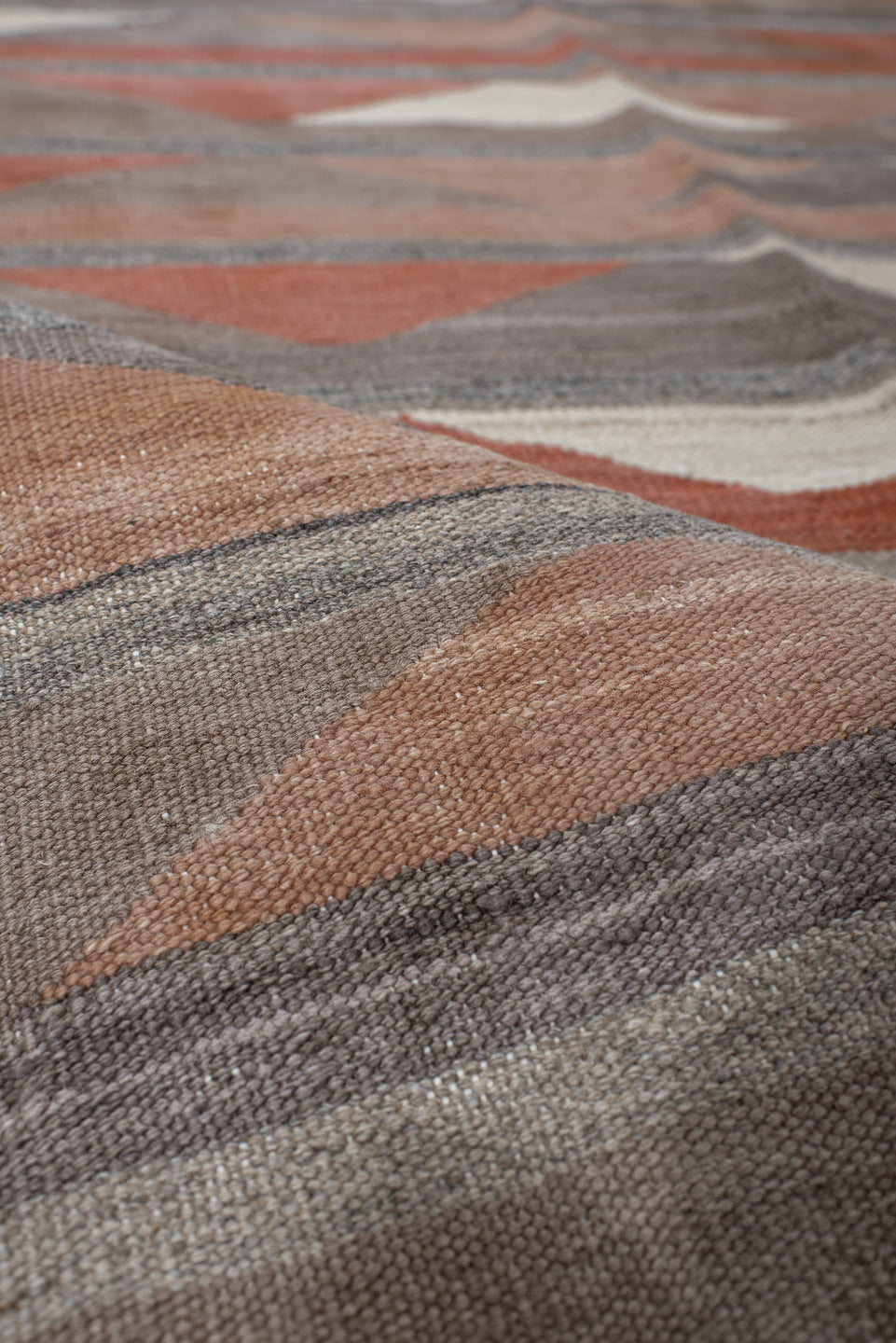 3' x 9' one-of-a-kind handmade vintage Kilim runner rug. Color palette: brown, gray, light gray, off-white, pink