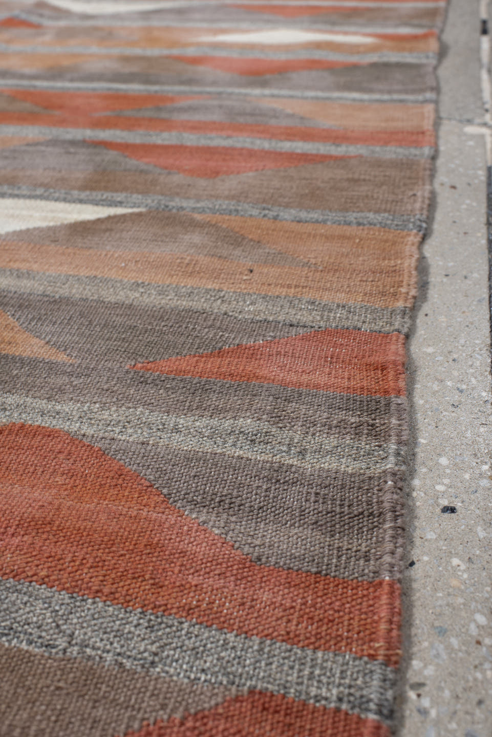 3' x 9' one-of-a-kind handmade vintage Kilim runner rug. Color palette: taupe, rust, terra cotta, gray, ivory, peach, beige