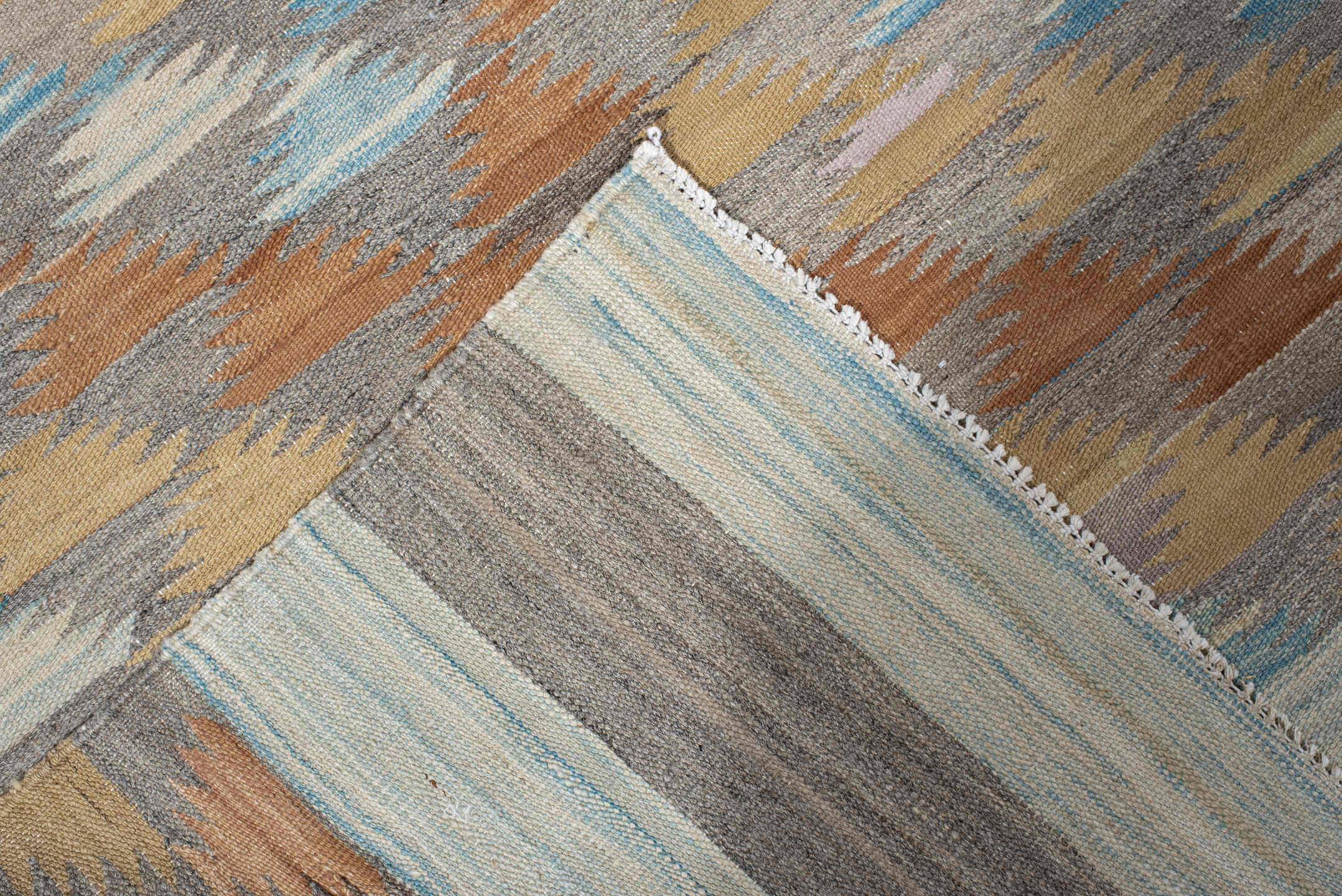 3' x 9' one-of-a-kind handmade vintage Kilim runner rug. Color palette: taupe, camel, ivory, rust, pale_blue, gray, beige