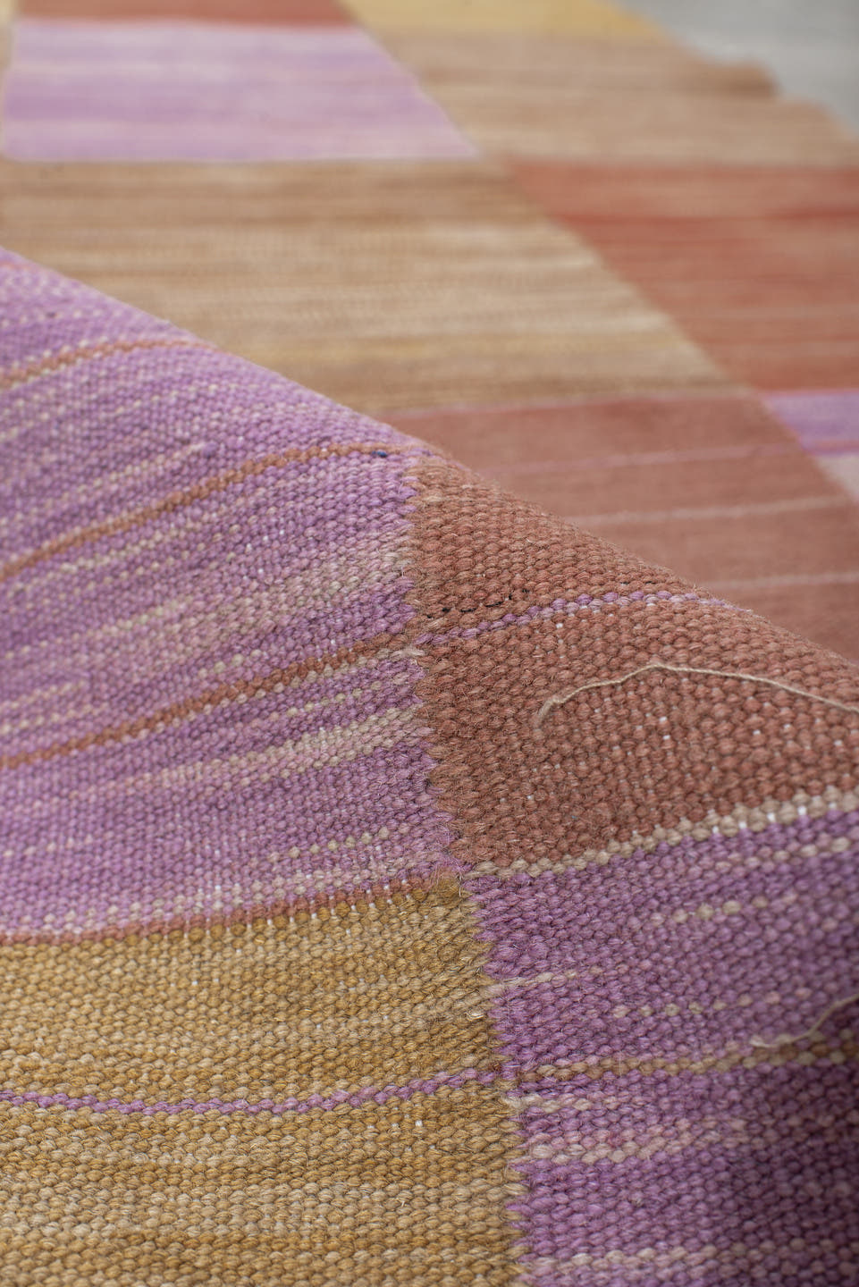 2' x 10' one-of-a-kind handmade vintage Kilim runner rug. Color palette: camel, rose, rust, lavender, tan, beige, pink, red