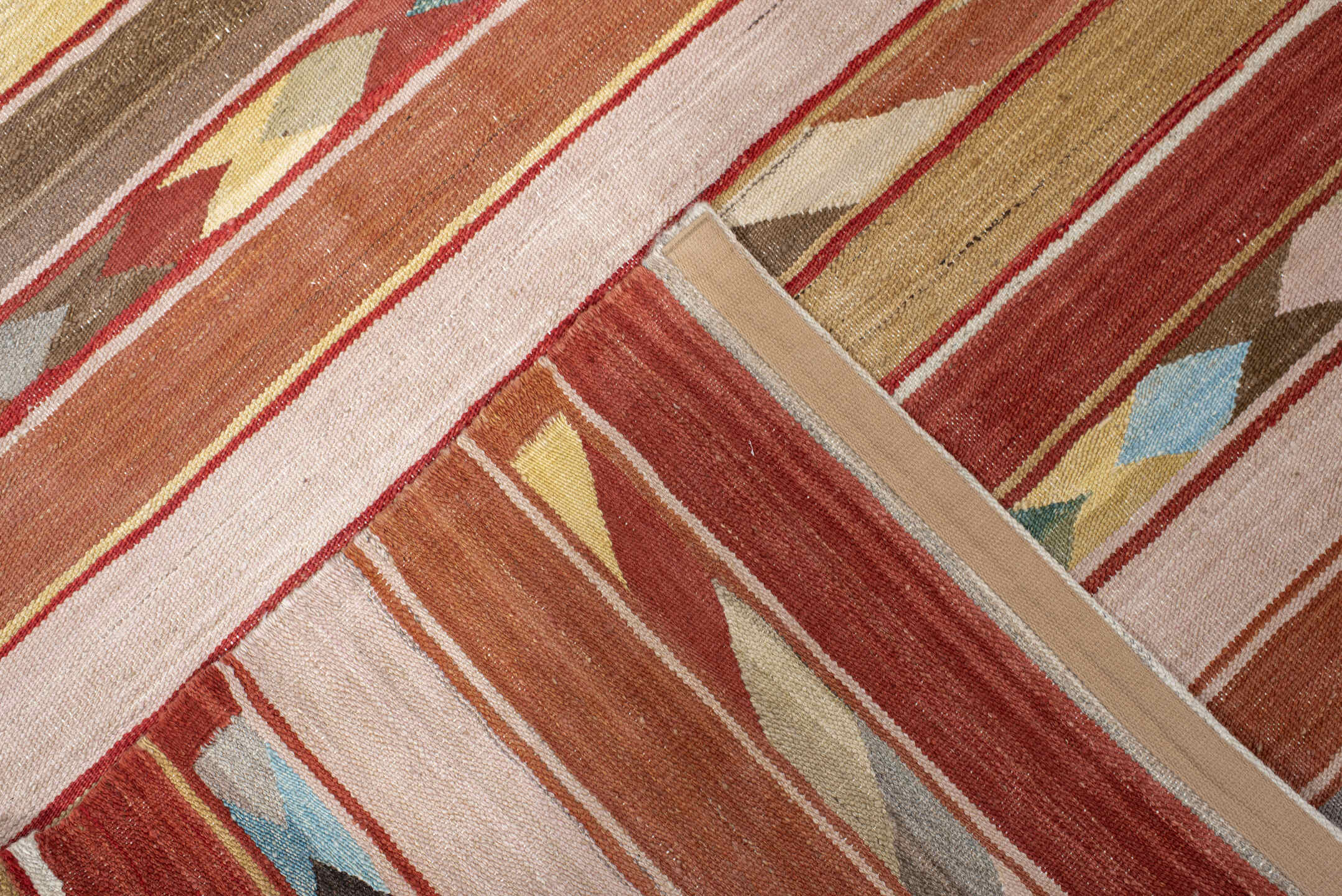 3' x 9' one-of-a-kind handmade vintage Kilim runner rug. Color palette: terra cotta, ivory, camel, taupe, rust, muted blue