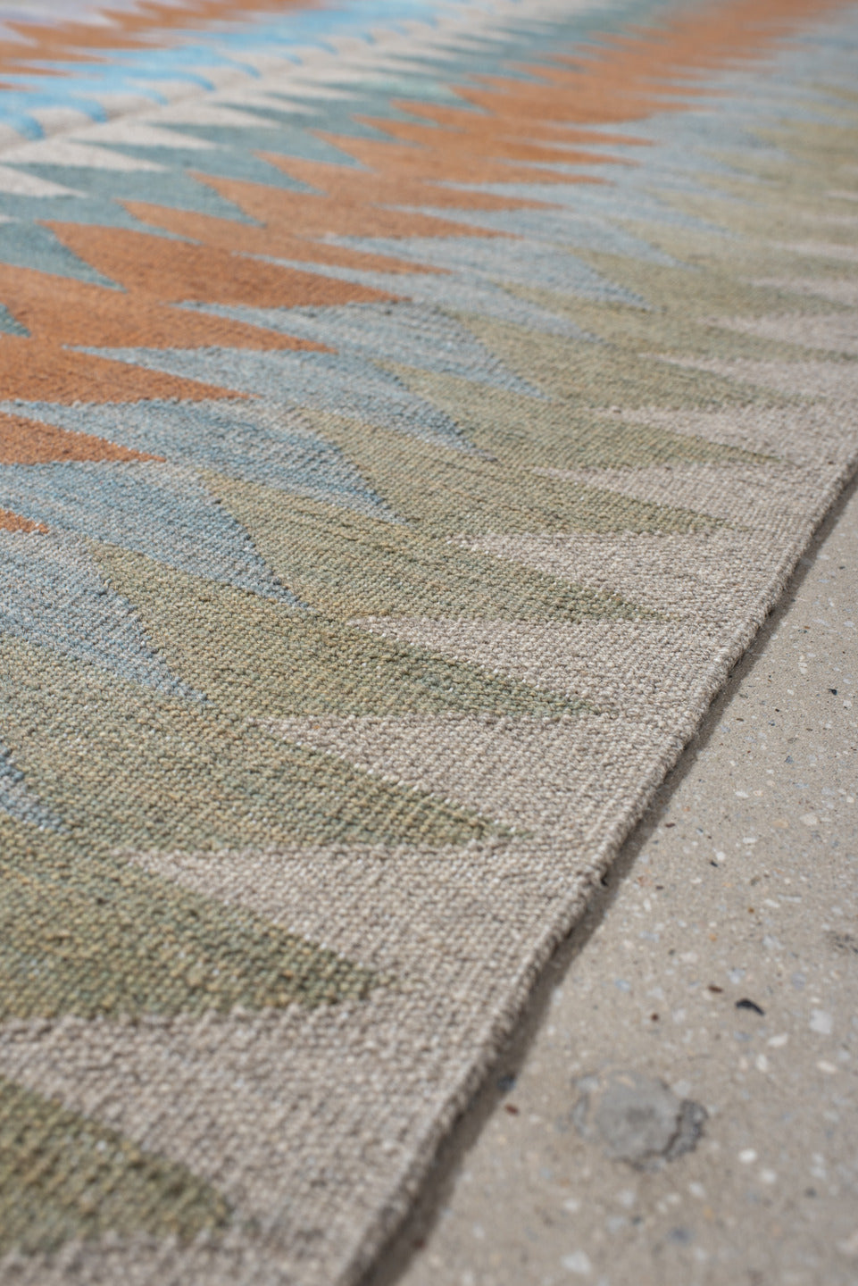 3' x 9' one-of-a-kind handmade vintage Kilim runner rug. Color palette: ivory, sage, sky_blue, terra_cotta, pale_blue, taupe