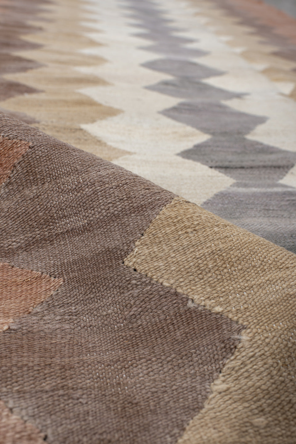 3' x 9' one-of-a-kind handmade vintage Kilim runner rug. Color palette: brown, gray, light gray, off-white, pink