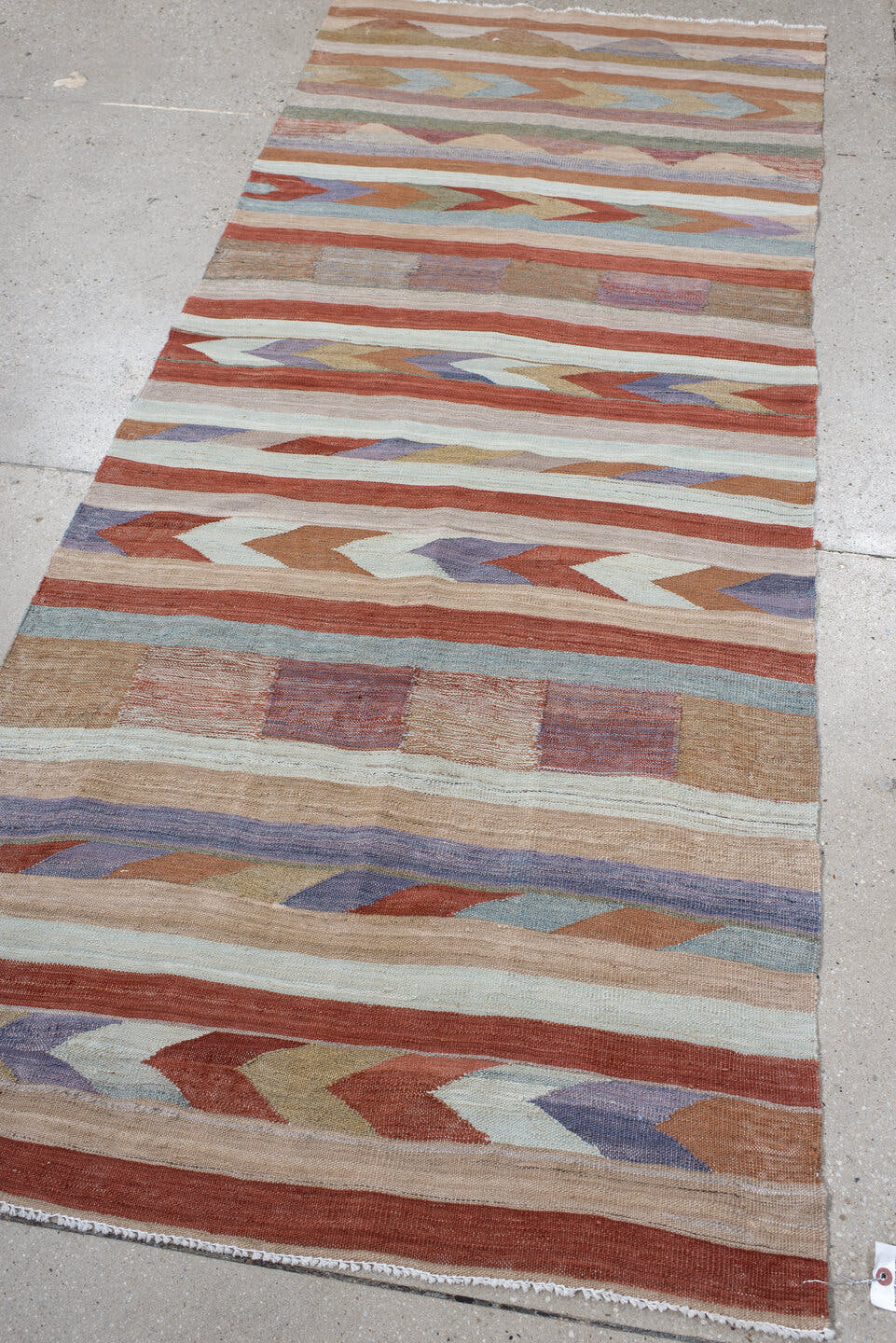 3' x 7' one-of-a-kind handmade vintage Kilim runner rug. Color palette: terra cotta, ivory, taupe, lavender, sky blue, sage