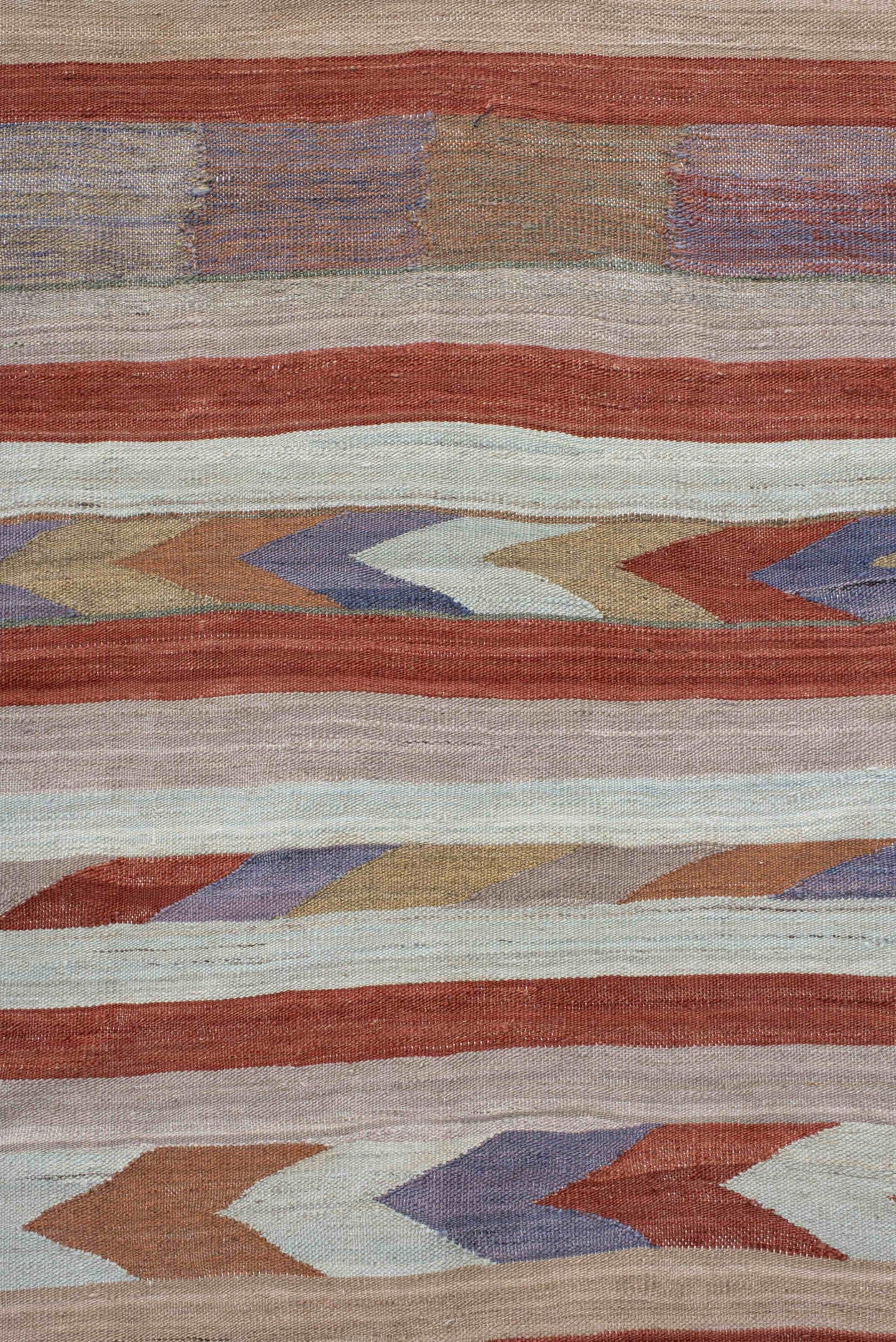3' x 7' one-of-a-kind handmade vintage Kilim runner rug. Color palette: terra cotta, ivory, taupe, lavender, sky blue, sage