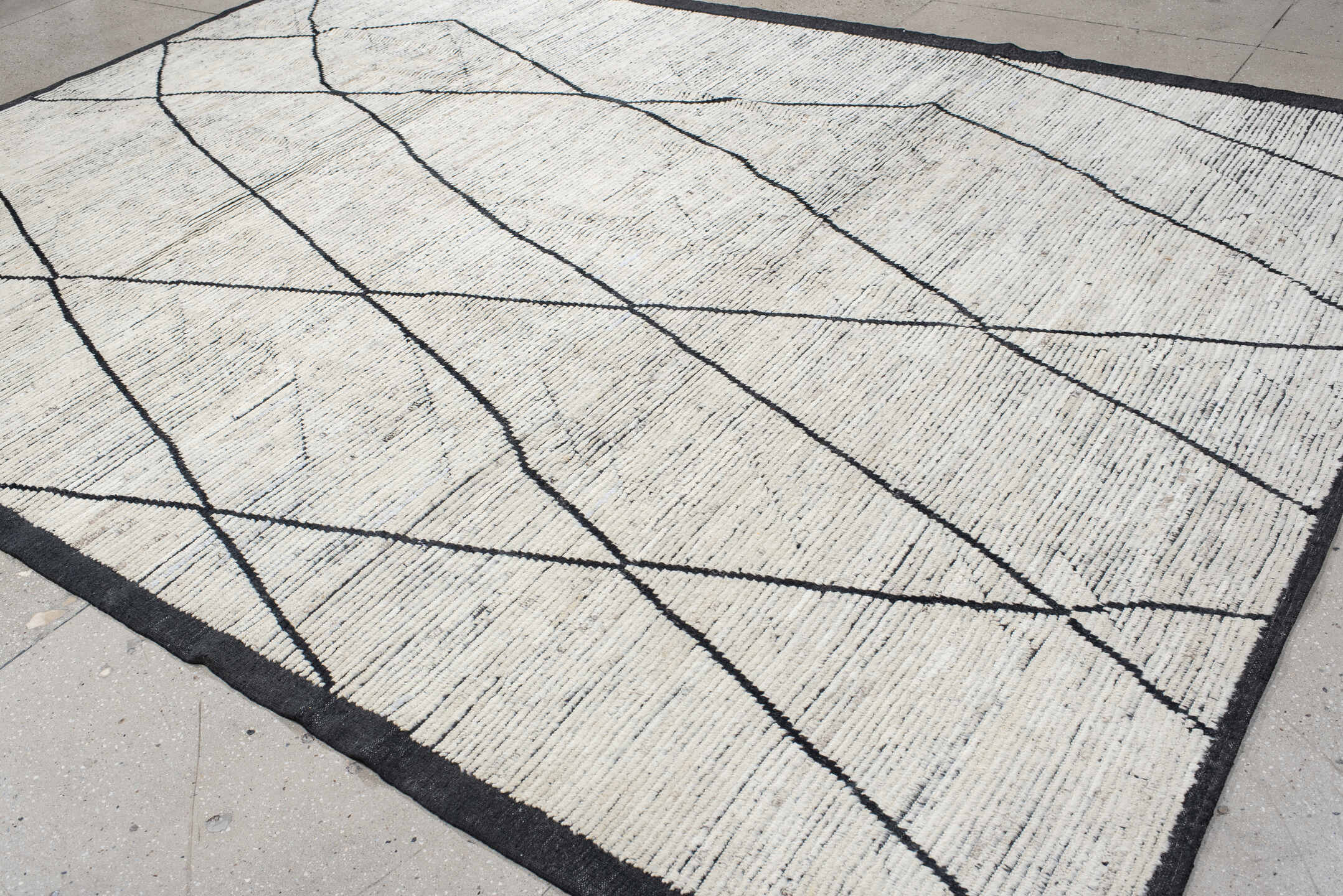 9' x 12' one-of-a-kind handmade vintage Tulu large size rug. Color palette: ivory, charcoal, black, cream, gray