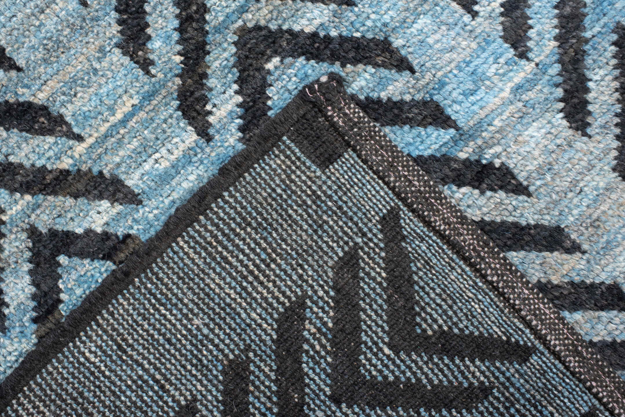 6' x 9' one-of-a-kind handmade vintage Tulu medium size rug. Color palette: sky blue, charcoal, slate, black, light blue