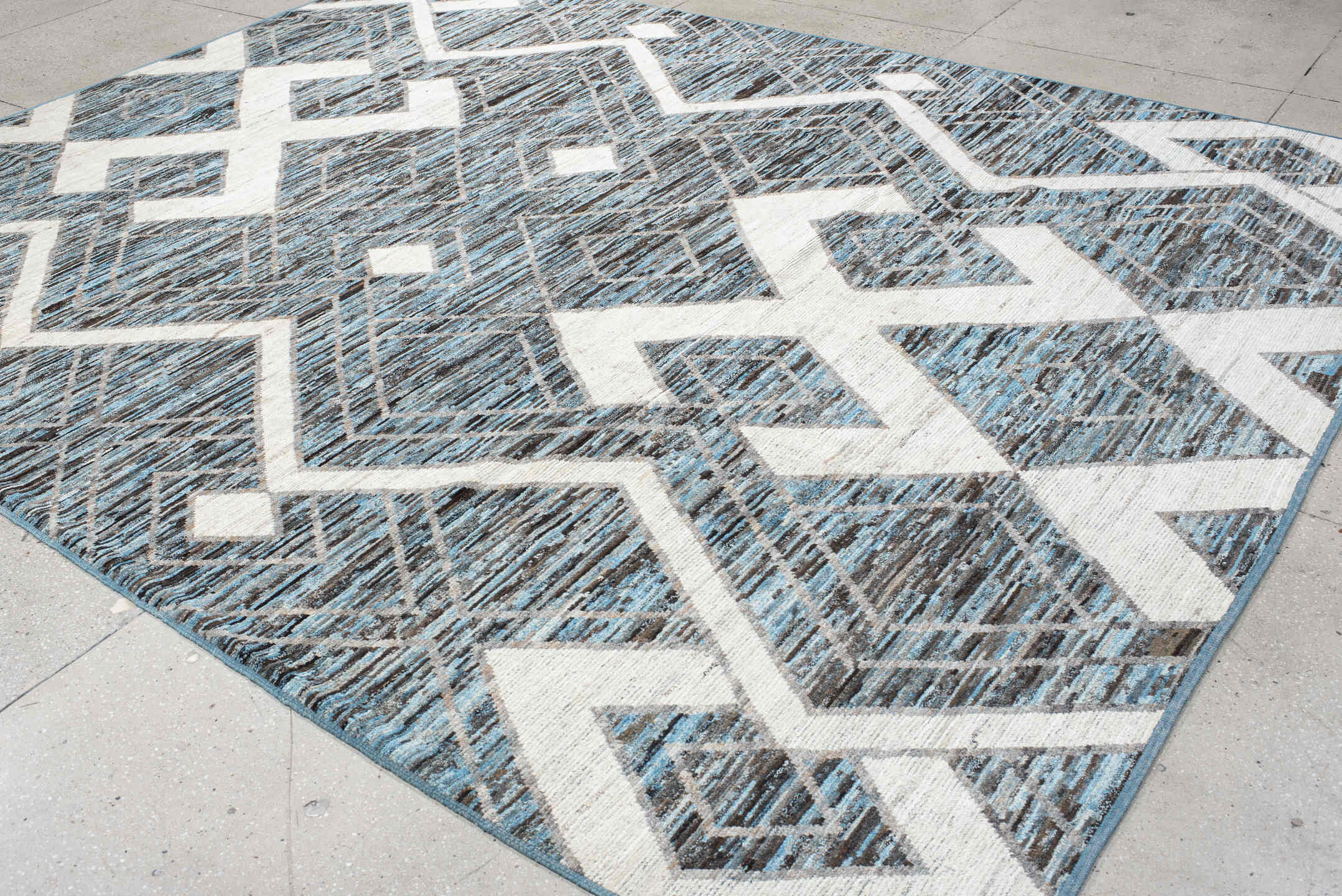 9' x 11' one-of-a-kind handmade vintage Tulu large size rug. Color palette: charcoal, ivory, turquoise, slate, sky_blue