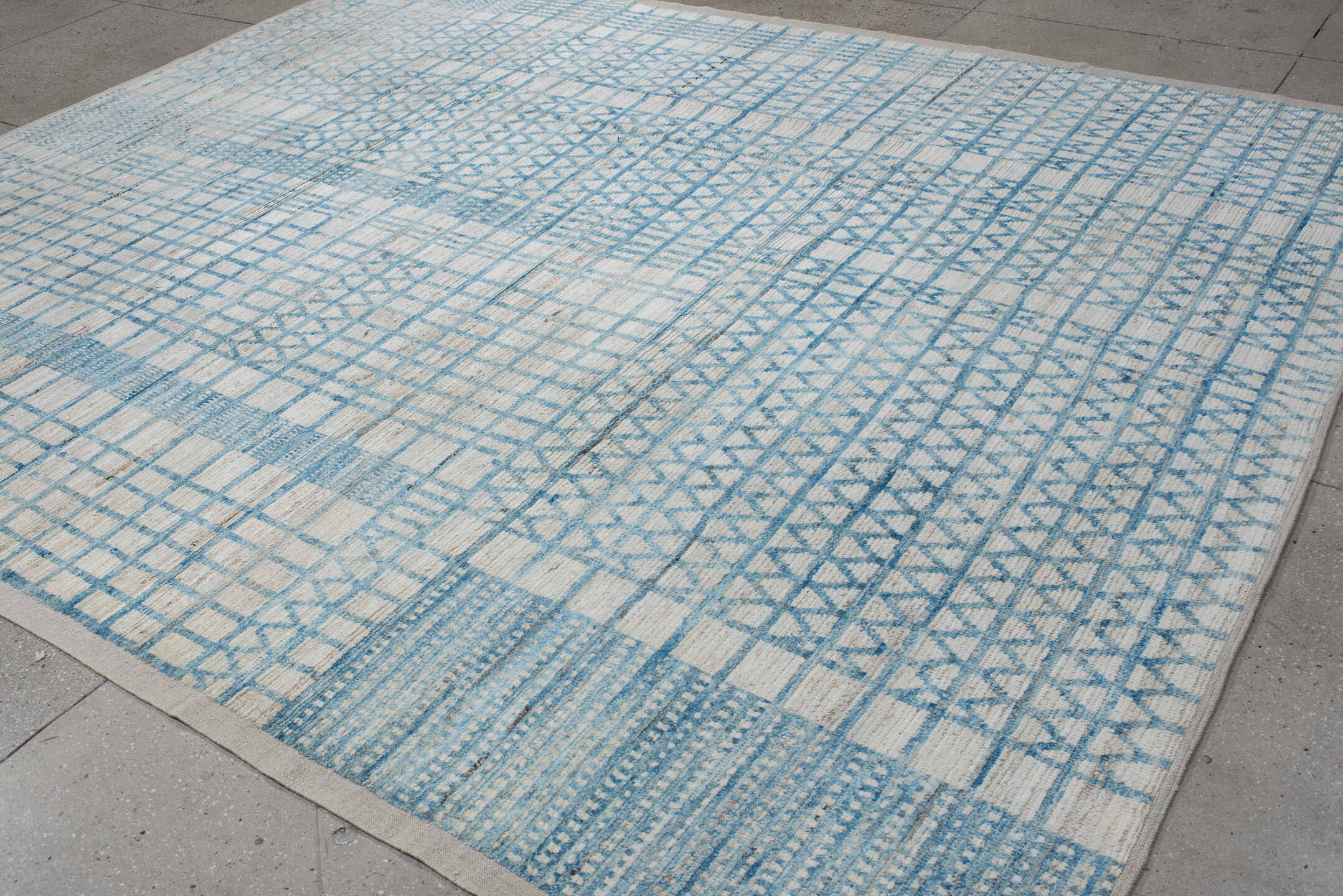 9' x 11' one-of-a-kind handmade vintage Tulu large size rug. Color palette: ivory, sky blue, pale blue, light gray