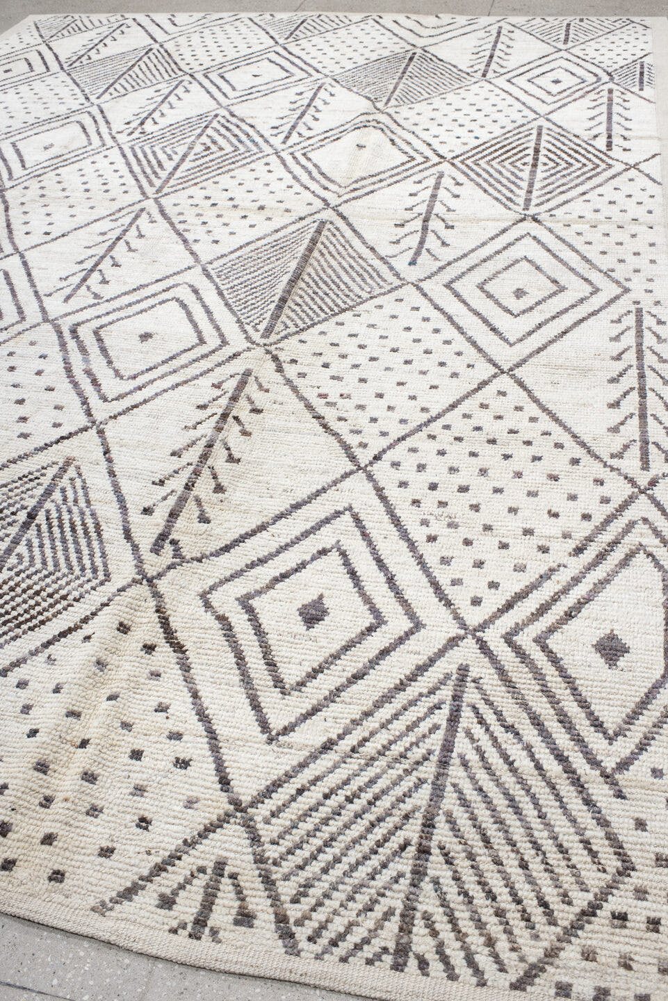 10' x 14' one-of-a-kind handmade vintage Tulu large size rug. Color palette: ivory, charcoal, taupe, brown, gray, black