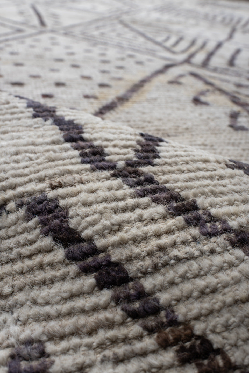 10' x 14' one-of-a-kind handmade vintage Tulu large size rug. Color palette: ivory, charcoal, taupe, brown, gray, black