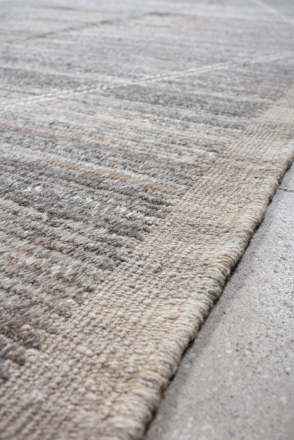 10' x 13' one-of-a-kind handmade vintage Tulu large size rug. Color palette: gray, taupe, ivory, greige, charcoal, beige