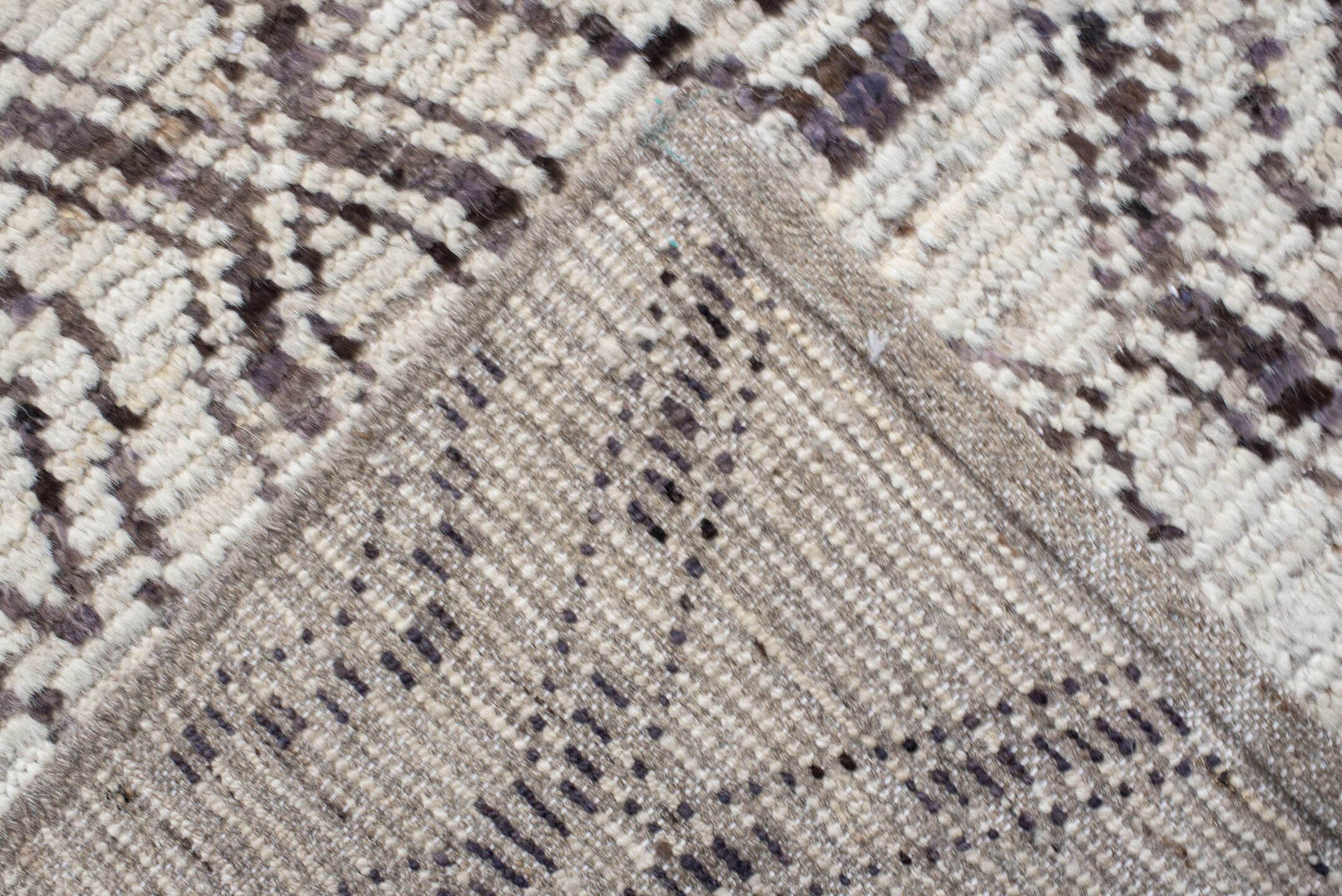 12' x 14' one-of-a-kind handmade vintage Tulu oversize rug. Color palette: ivory, charcoal, taupe, brown, gray, black, beige