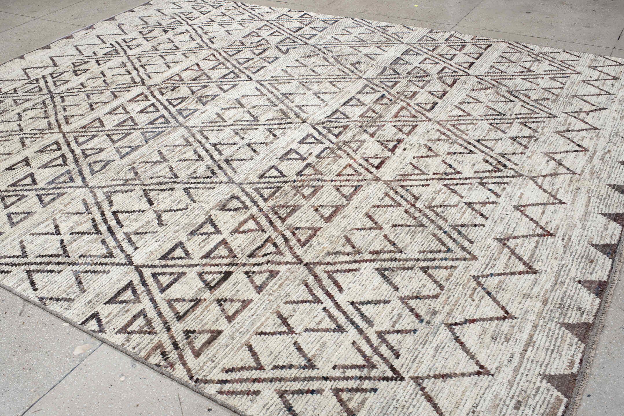 9' x 11' one-of-a-kind handmade vintage Tulu large size rug. Color palette: ivory, brown, taupe, charcoal, beige, gray
