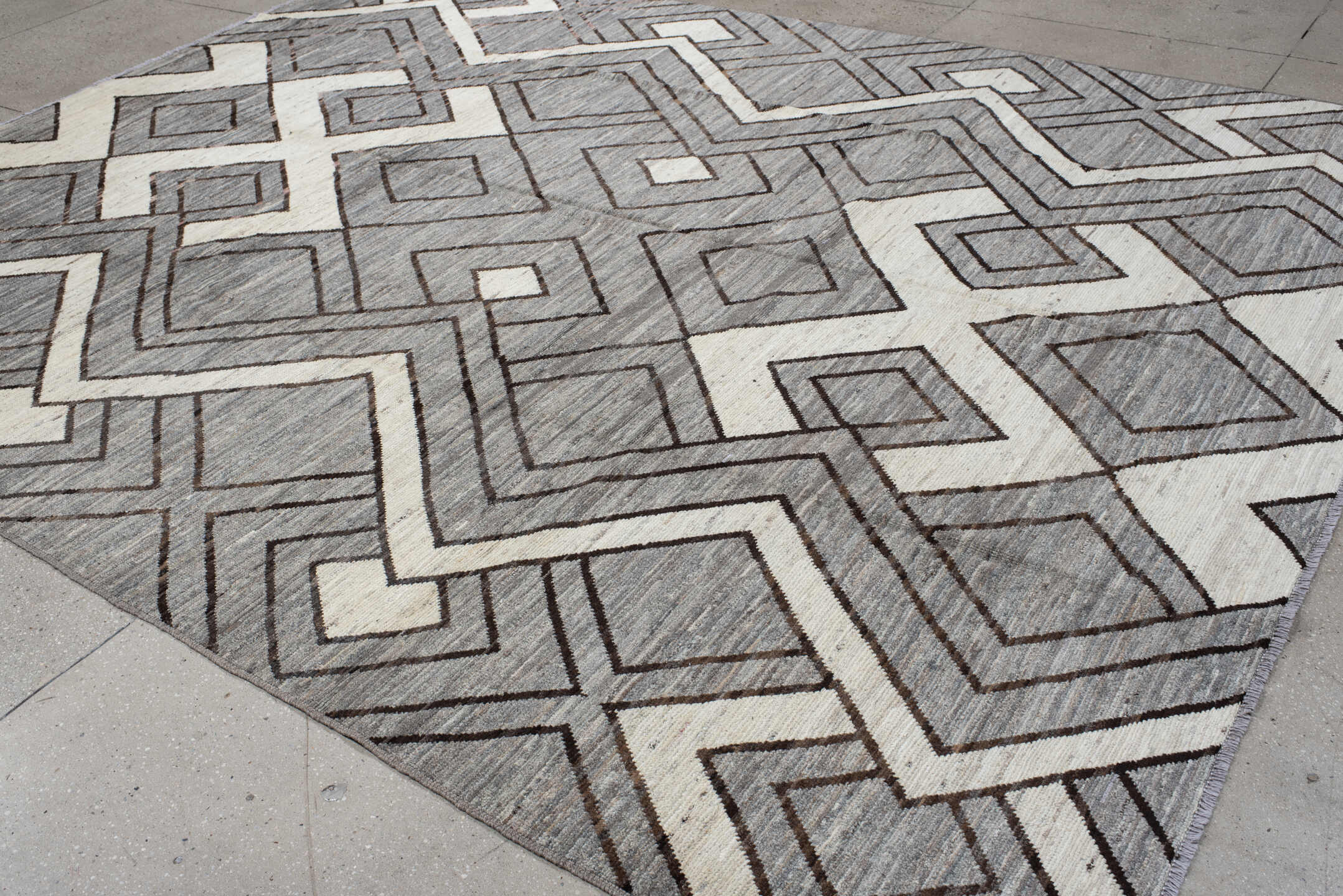 9' x 11' one-of-a-kind handmade vintage Tulu large size rug. Color palette: gray, ivory, charcoal, taupe, black, beige