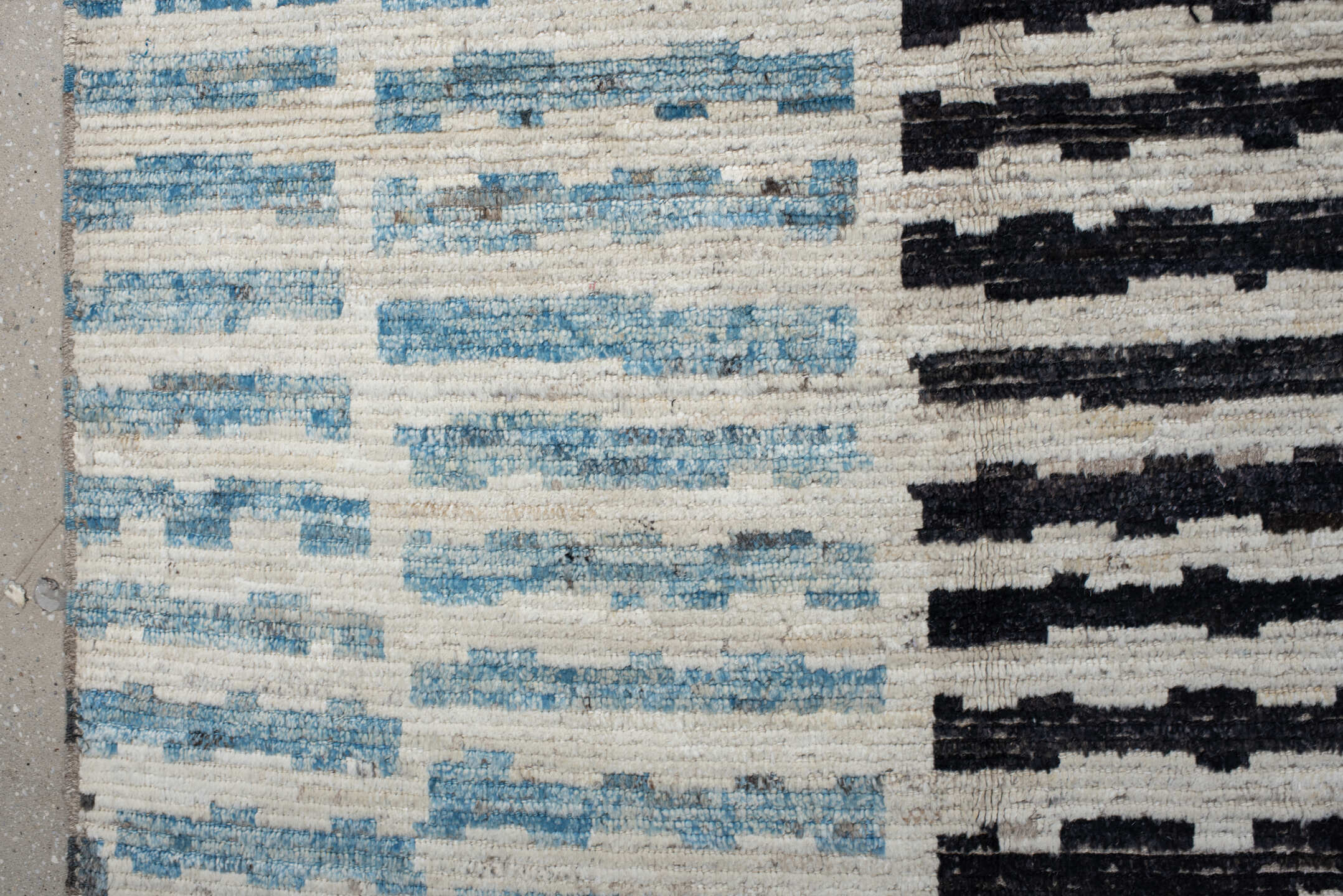 9' x 11' one-of-a-kind handmade vintage Tulu large size rug. Color palette: ivory, sky blue, charcoal, gray, black
