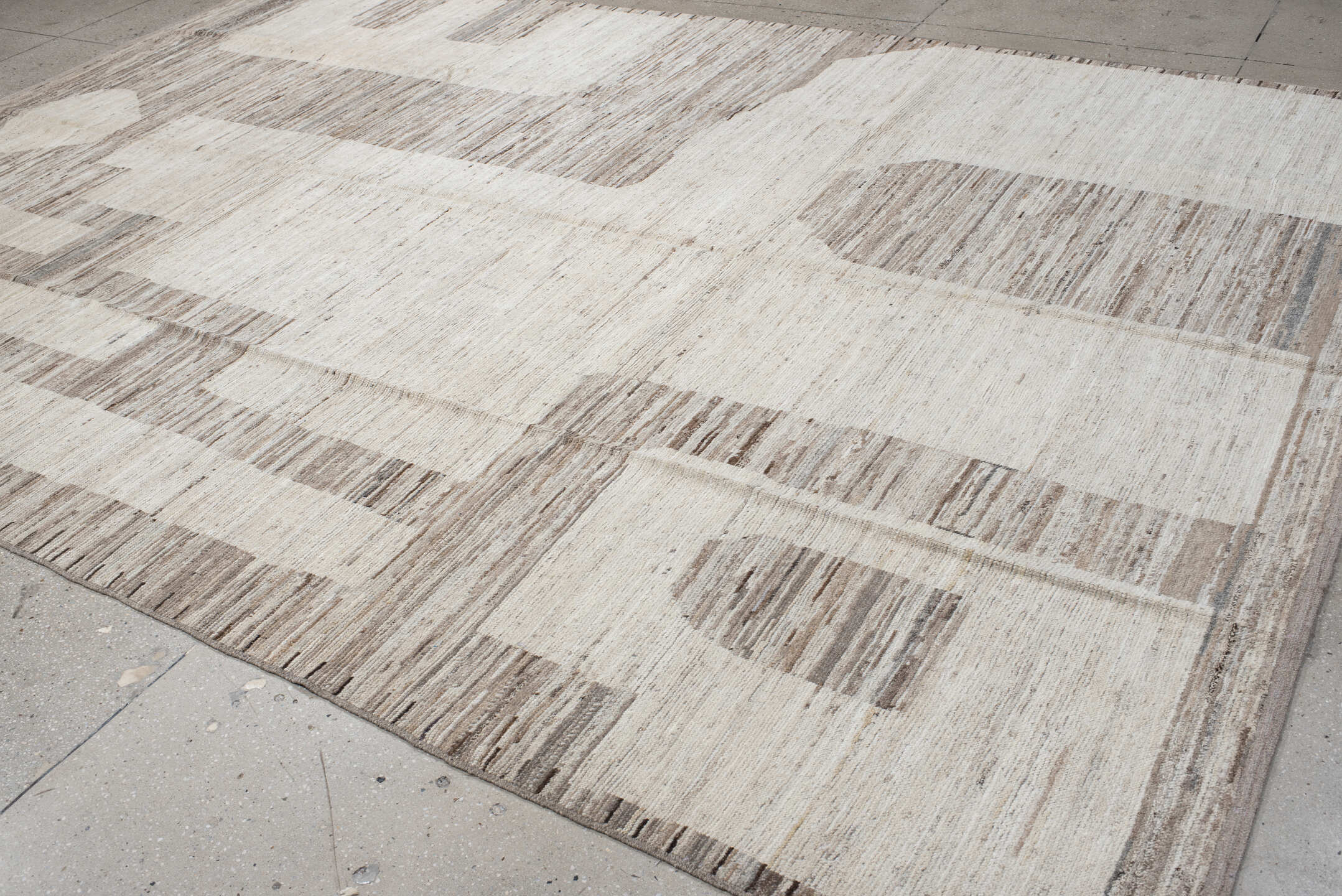 9' x 13' one-of-a-kind handmade vintage Tulu large size rug. Color palette: ivory, taupe, beige, cream, greige, stone, gray