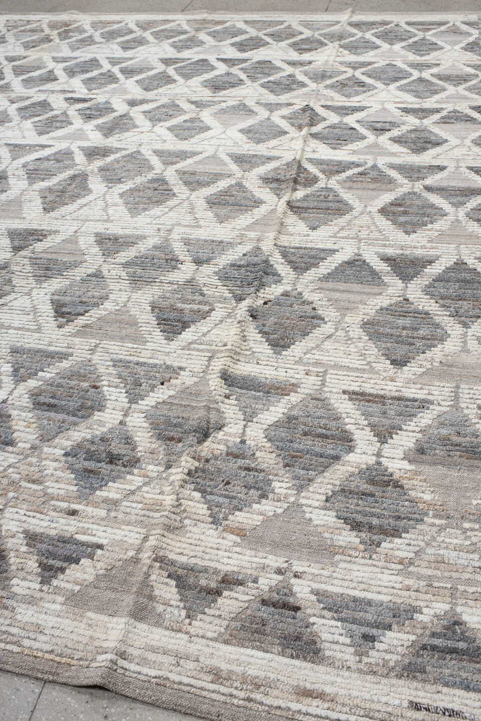 11' x 13' one-of-a-kind handmade vintage Tulu oversize rug. Color palette: gray, ivory, taupe, greige, beige