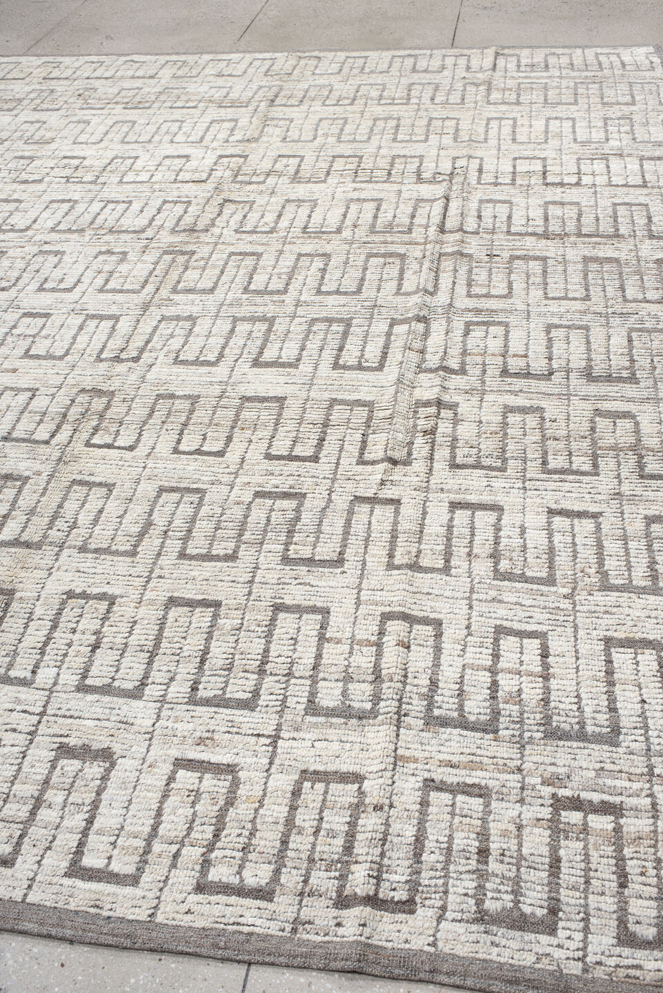 9' x 11' one-of-a-kind handmade vintage Tulu large size rug. Color palette: ivory, taupe, gray, charcoal, beige, black