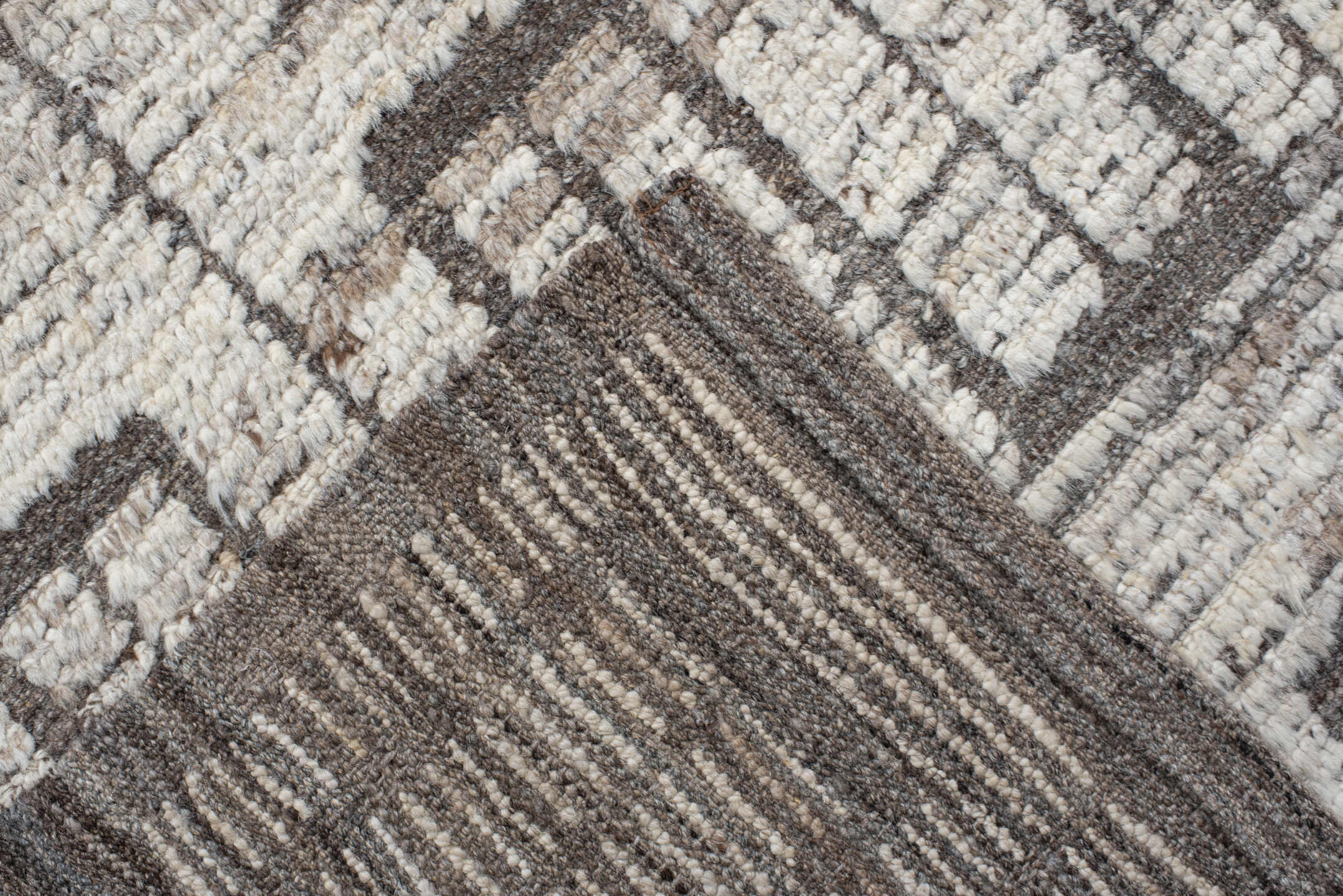 9' x 11' one-of-a-kind handmade vintage Tulu large size rug. Color palette: ivory, taupe, gray, charcoal, beige, black