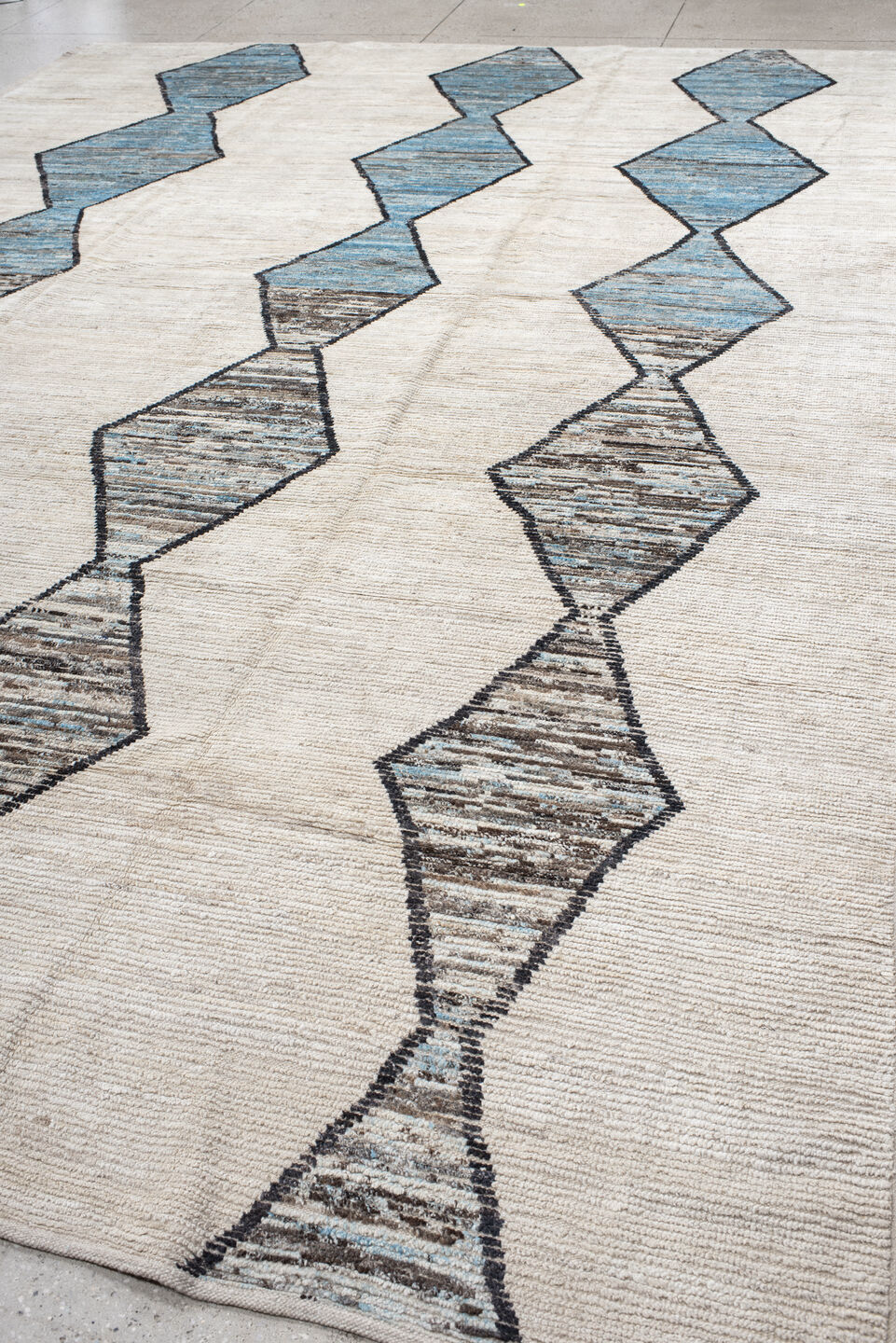 11' x 15' one-of-a-kind handmade vintage Tulu oversize rug. Color palette: black, blue, charcoal, dark gray, dim gray