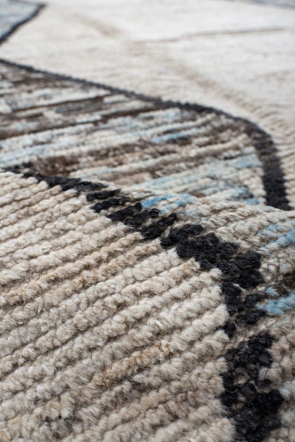 11' x 15' one-of-a-kind handmade vintage Tulu oversize rug. Color palette: ivory, sky blue, taupe, charcoal, cream
