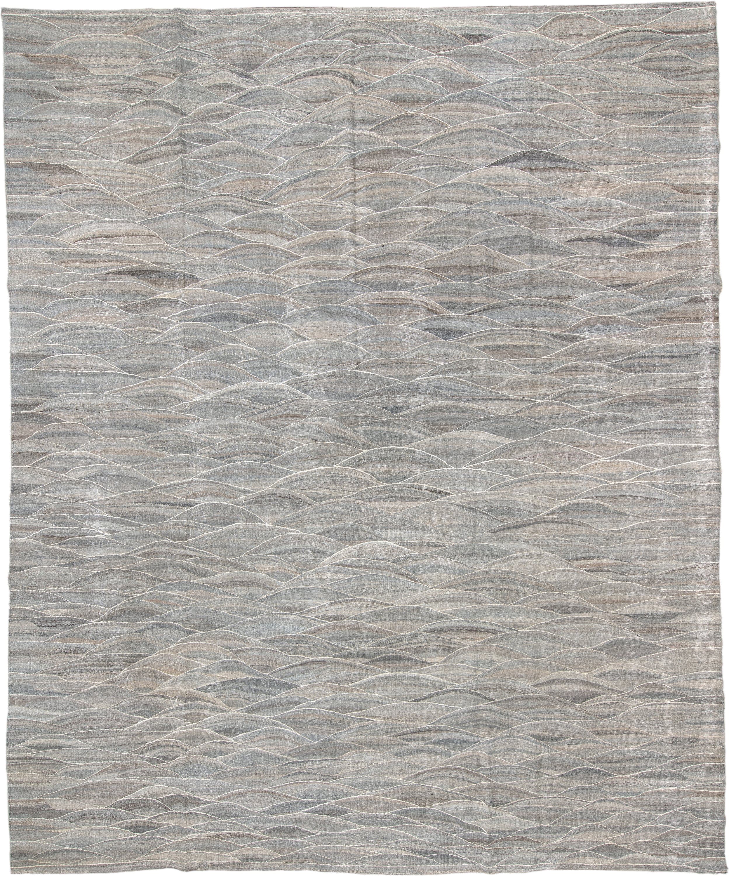 12' x 15' one-of-a-kind handmade vintage Kilim oversize rug. Color palette: gray, taupe, ivory, beige, slate