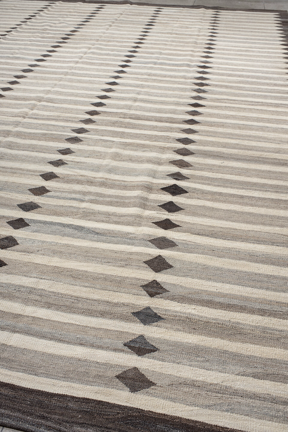 13' x 18' one-of-a-kind handmade vintage Kilim oversize rug. Color palette: black, charcoal, gray, light gray, linen