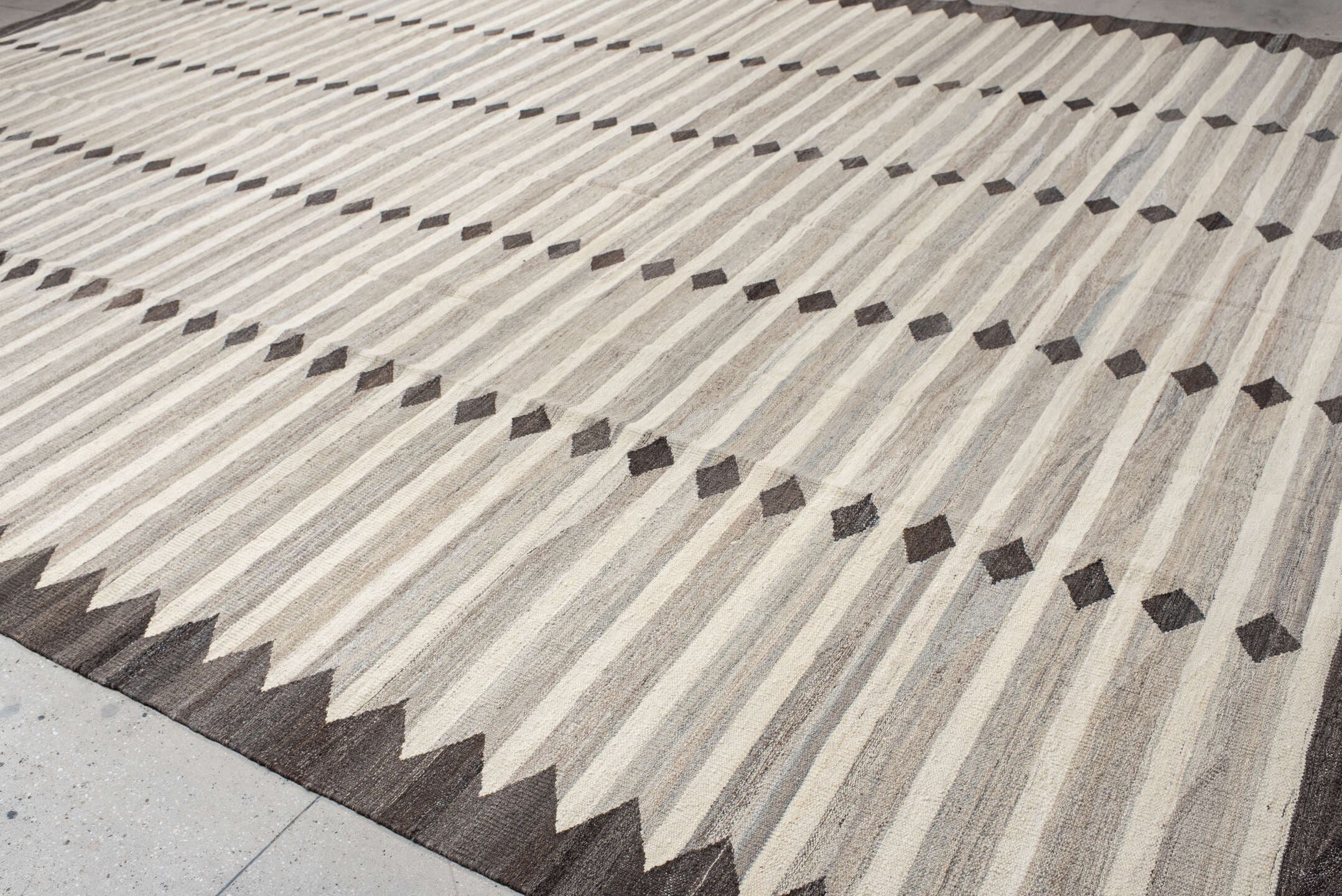 13' x 18' one-of-a-kind handmade vintage Kilim oversize rug. Color palette: ivory, charcoal, taupe, gray, cream, black