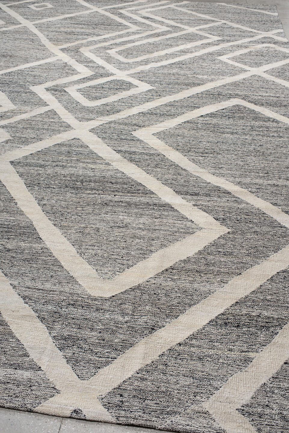 13' x 19' one-of-a-kind handmade vintage Kilim oversize rug. Color palette: gray, ivory, charcoal, black