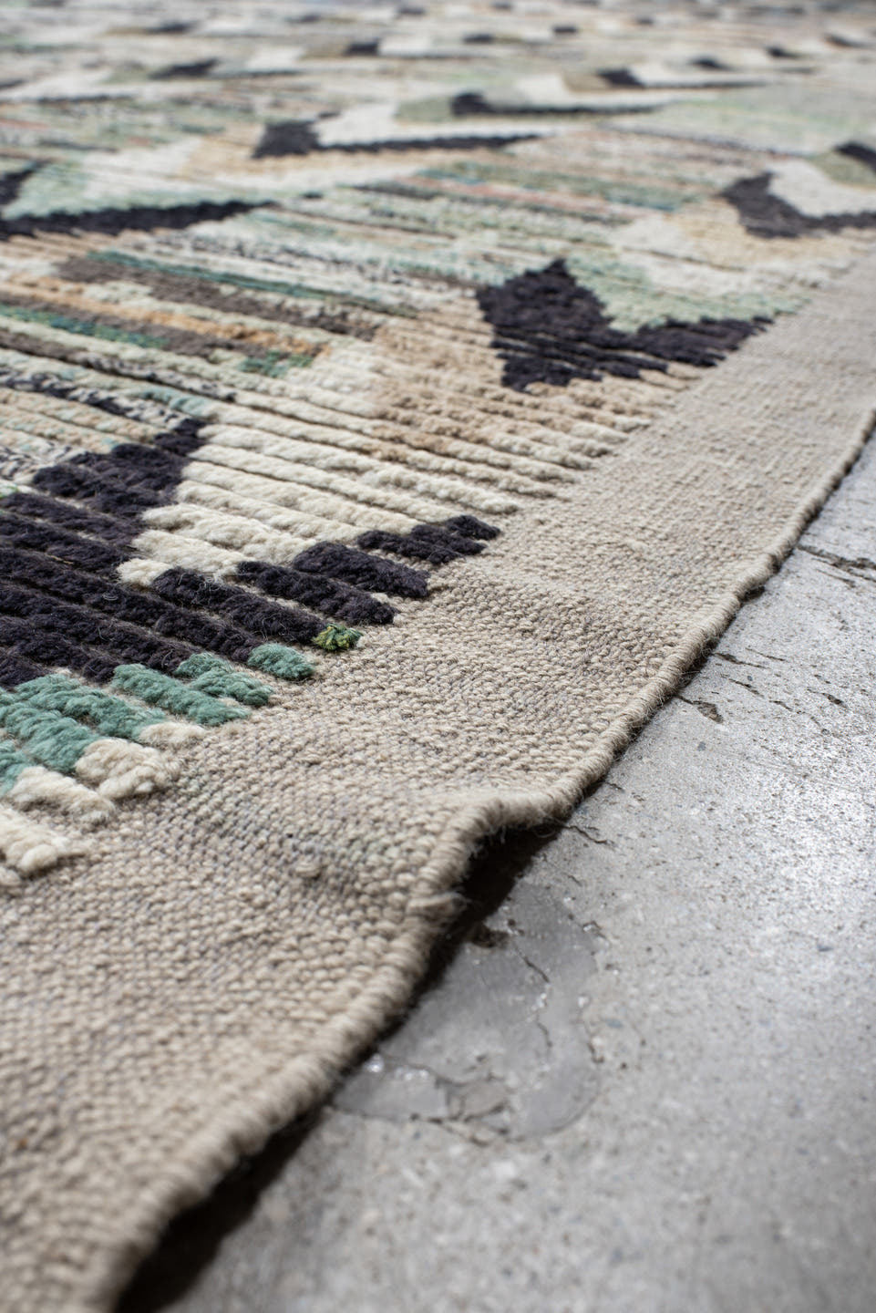 13' x 17' one-of-a-kind handmade vintage Tulu oversize rug. Color palette: ivory, gray, charcoal, aqua, taupe, sage, cream